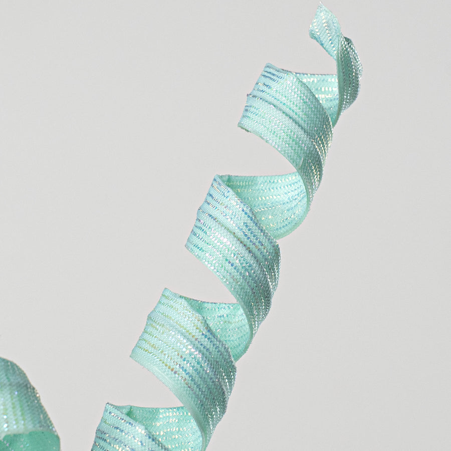 16" Pearlescent Pastel Curly Pick: Iridescent Mint Lifestyle Photo