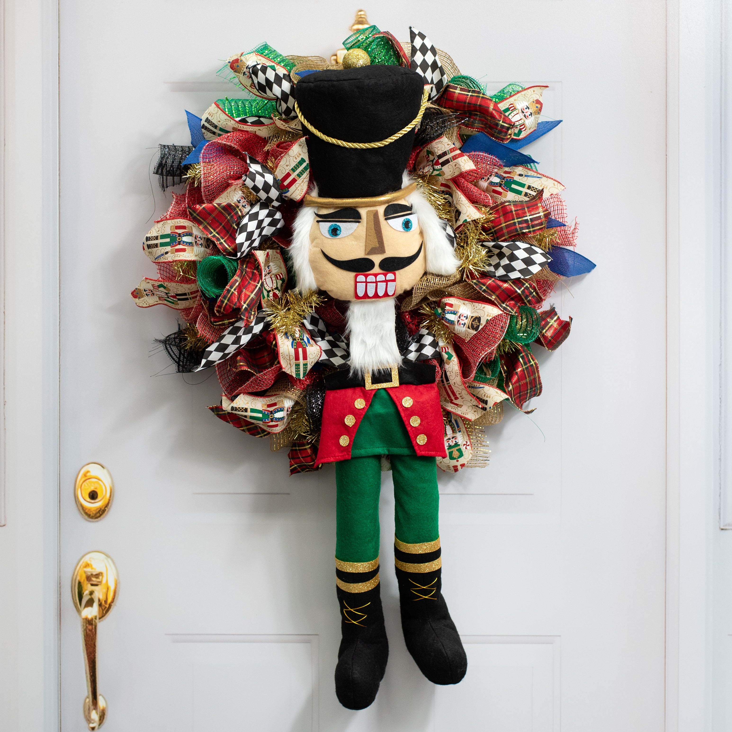 33" 2-Piece Nutcracker Wreath Accent: Black, Emerald & Red Lifestyle Photo