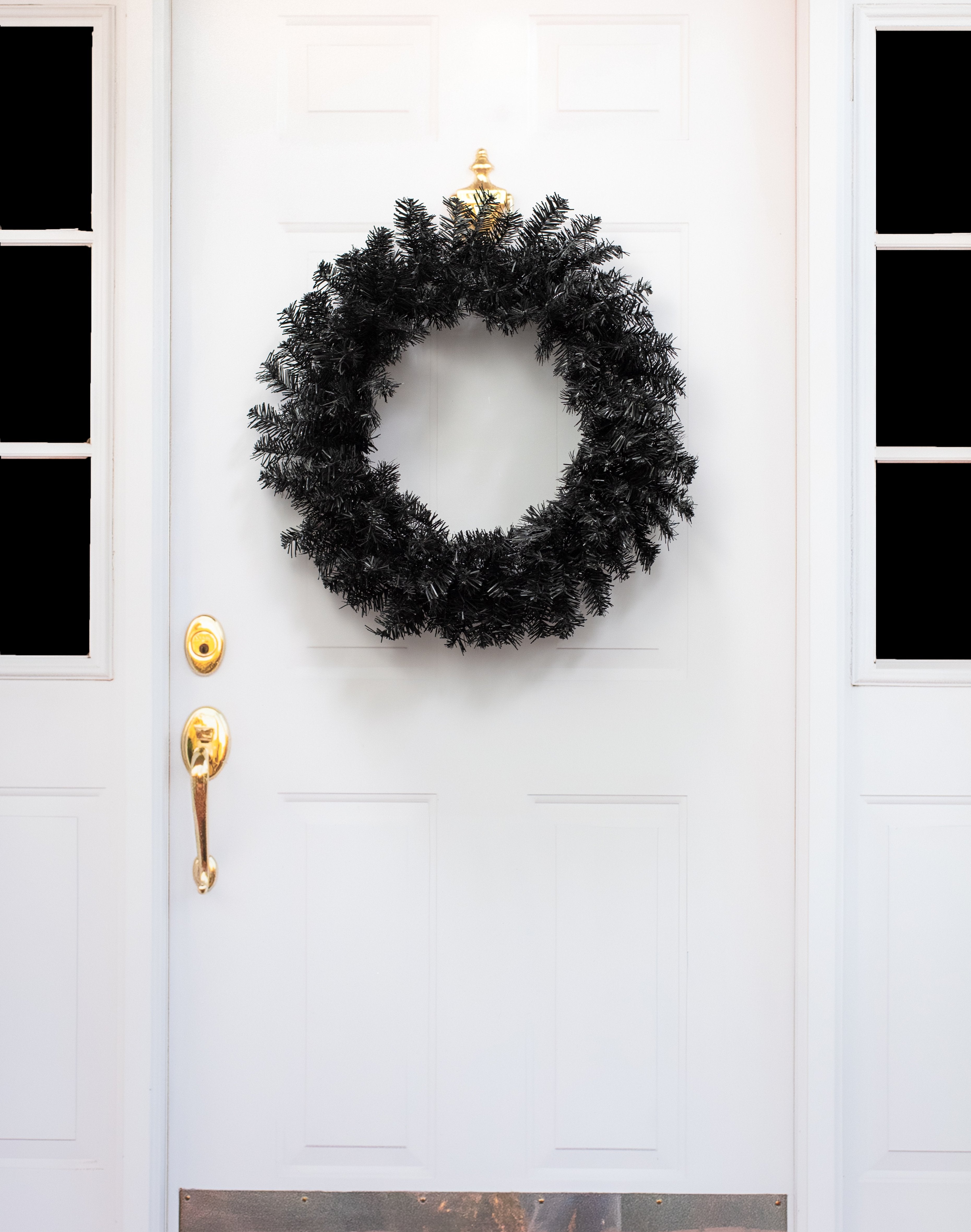 24" Pine Wreath: Black Lifestyle Photo