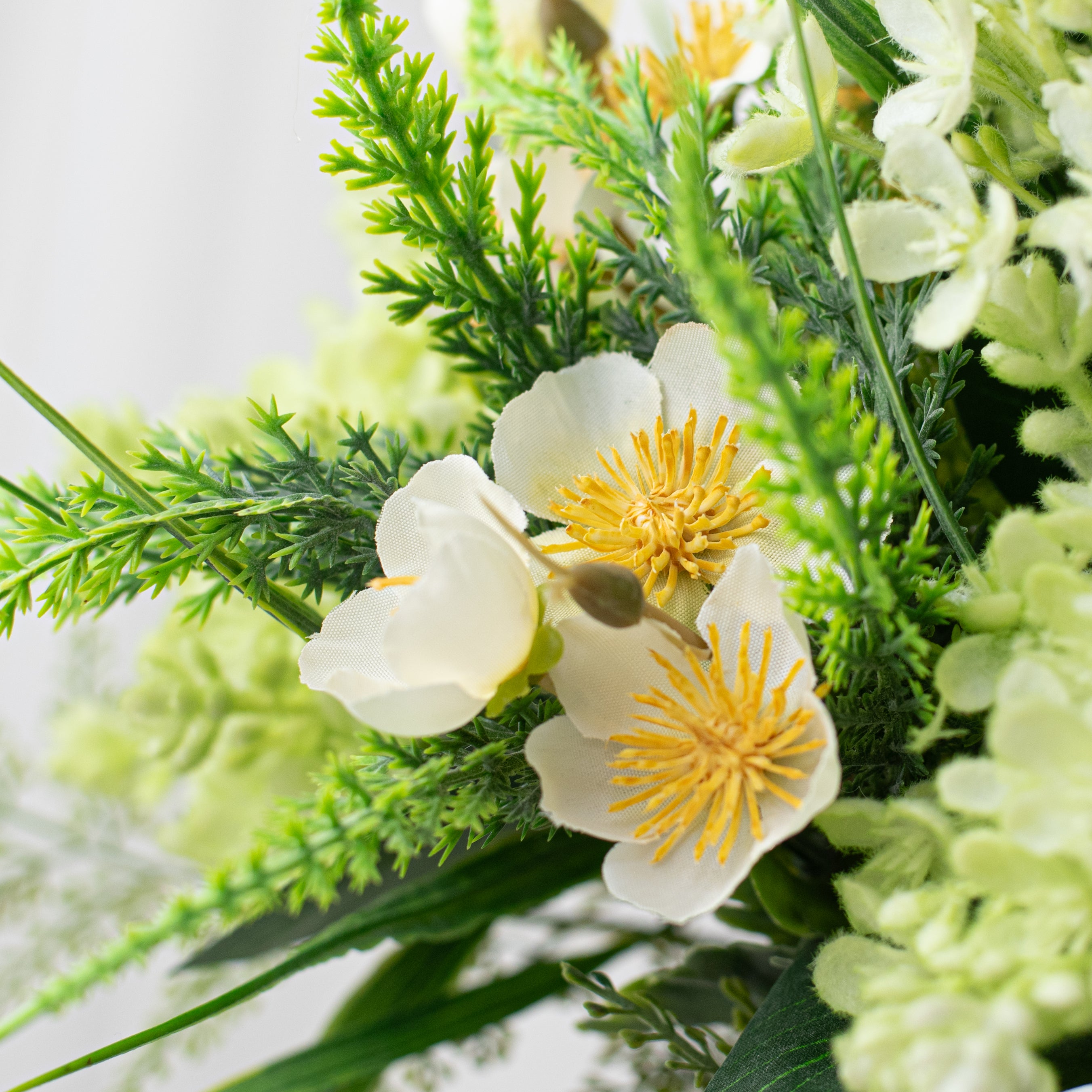17" Plum Blossom & Cedar Bouquet: White/Green Lifestyle Photo