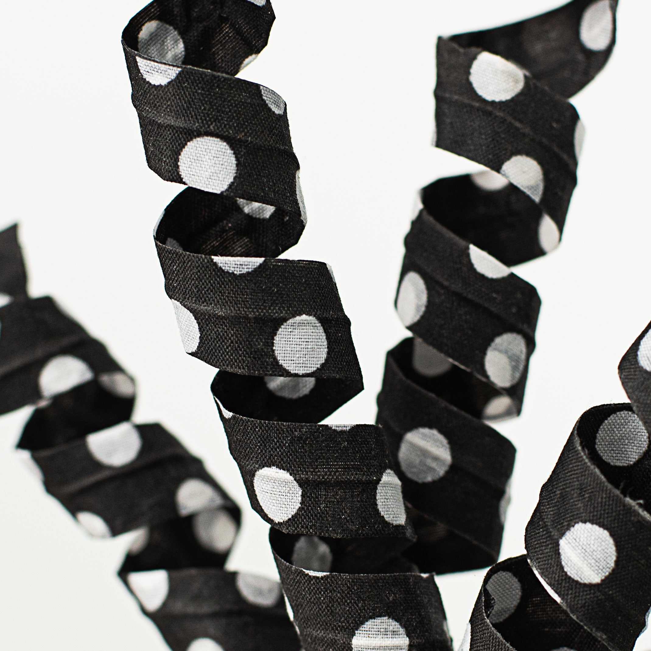 16" Polka Dot Curly Pick: Black & White Lifestyle Photo