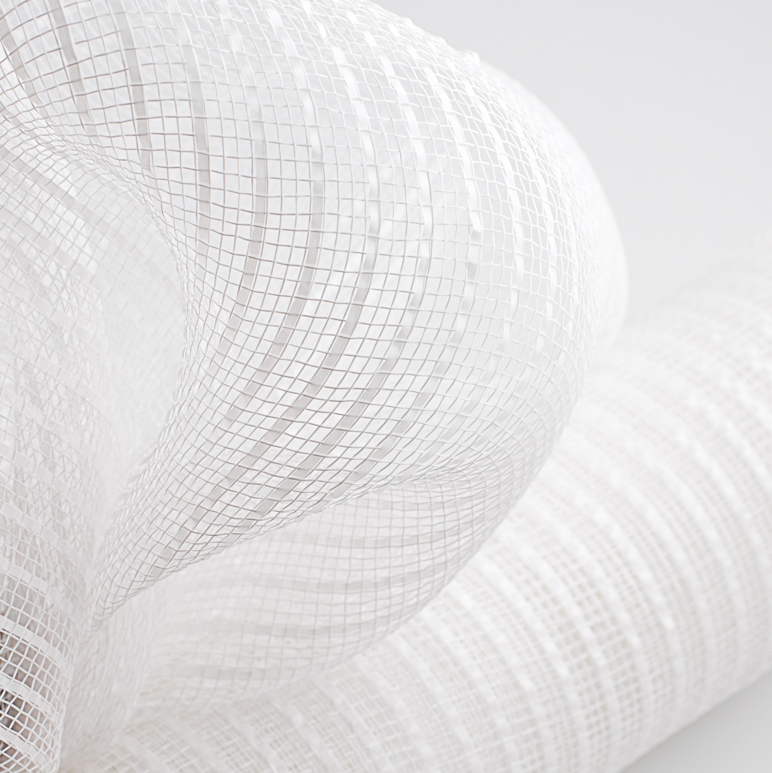 21" Poly Deco Mesh: Wide Foil Film White Lifestyle Photo