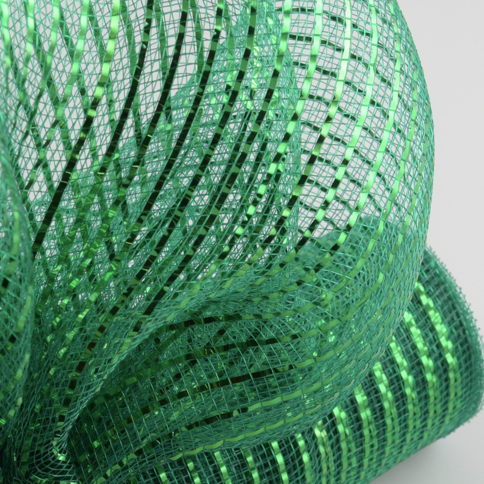 21" Poly Deco Mesh: Wide Foil Metallic Emerald Lifestyle Photo
