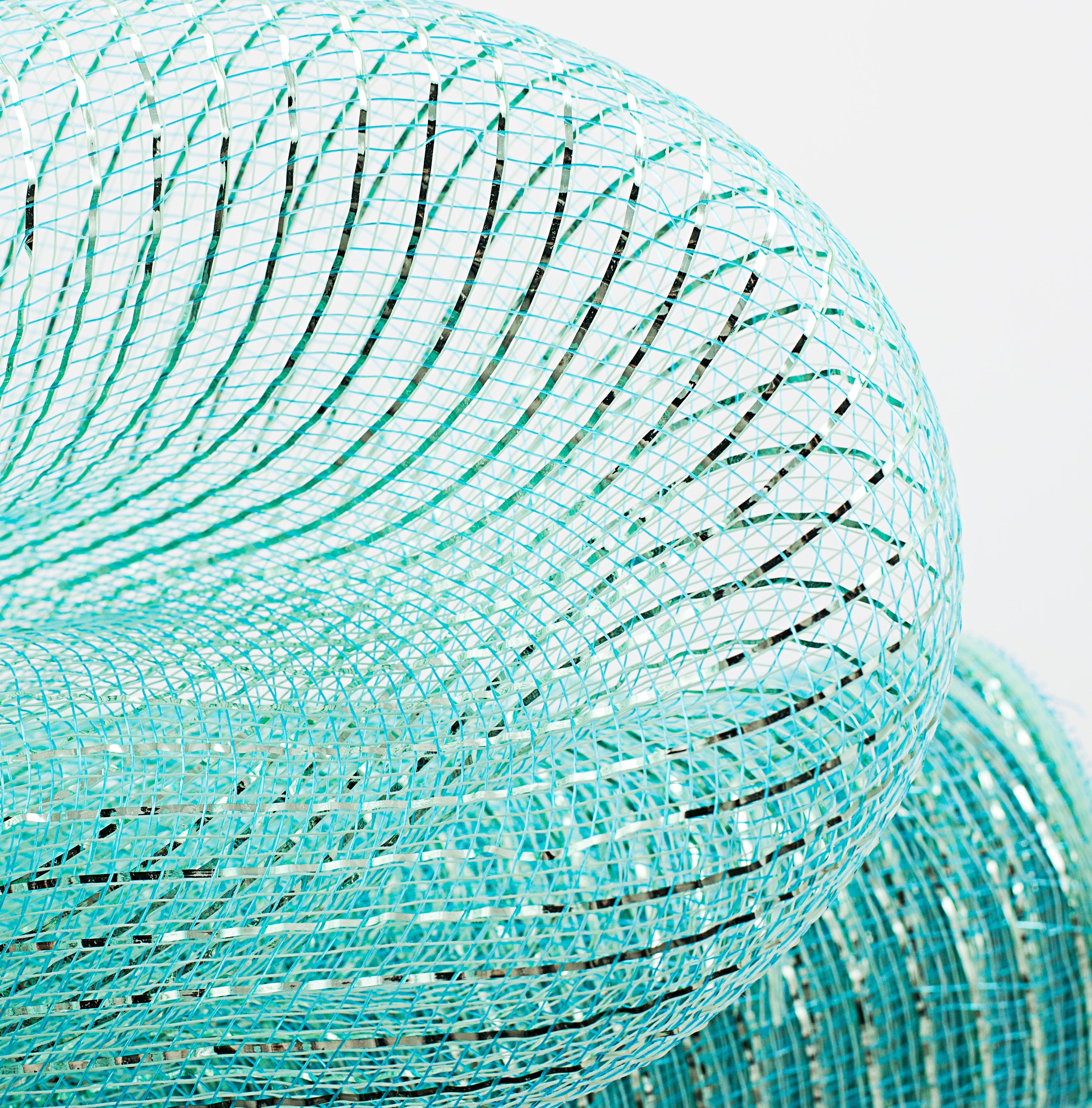 21" Poly Mesh Roll: Metallic Ice Blue Lifestyle Photo