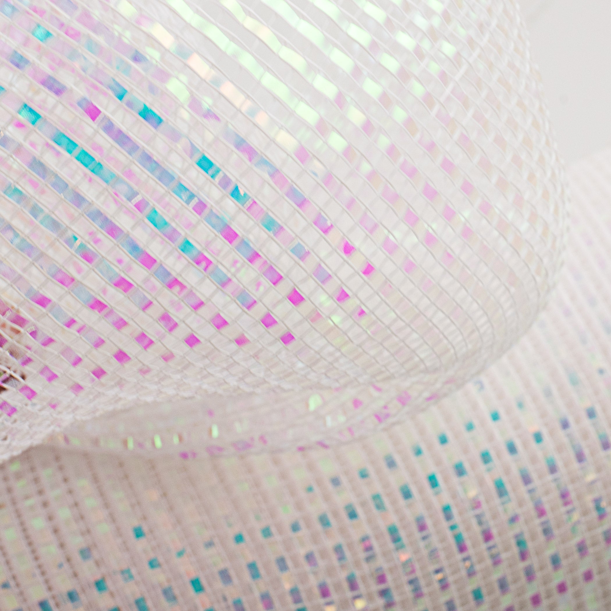 10" Poly Mesh Rolls: Deluxe Wide Foil White Iridescent Lifestyle Photo