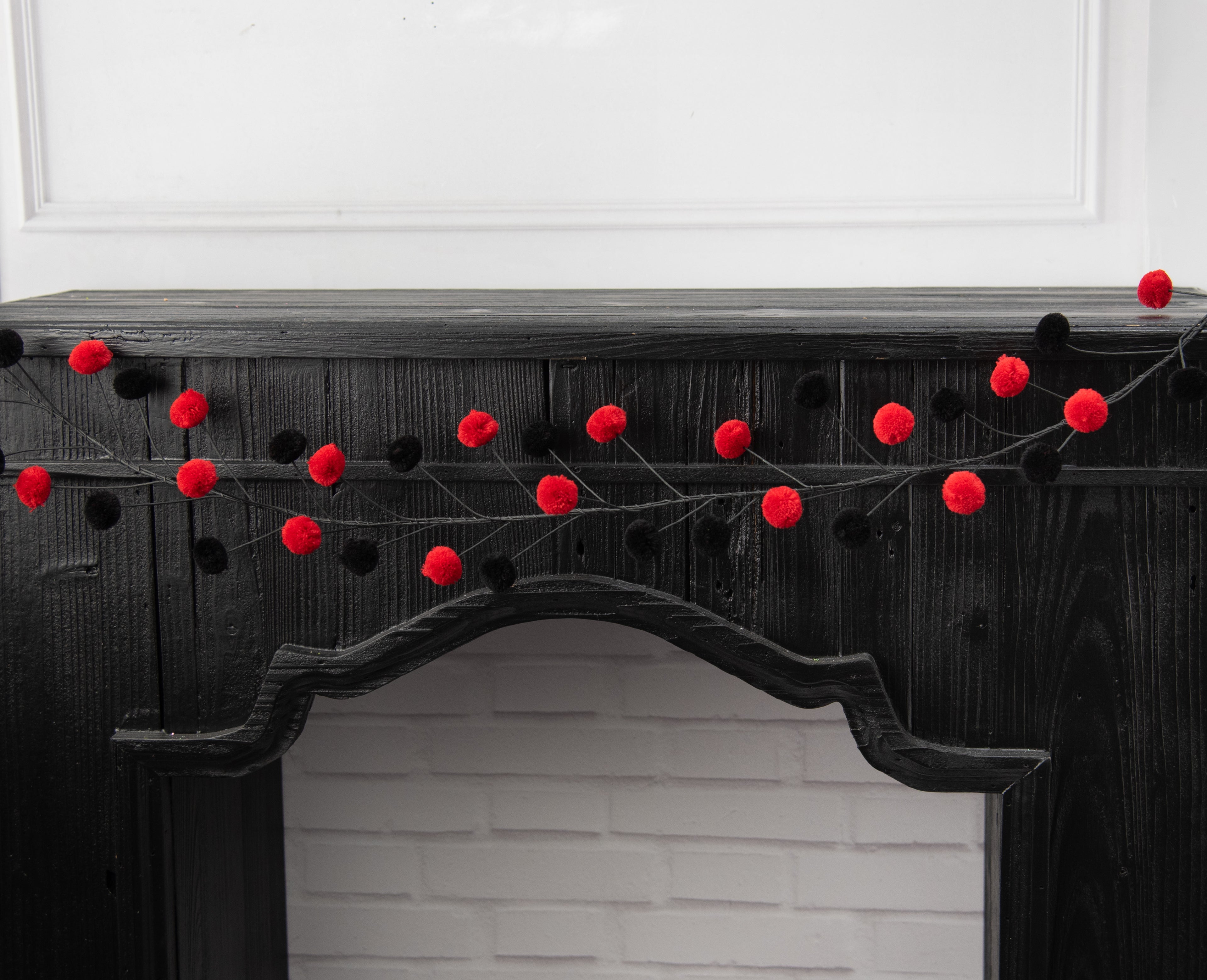 5' Pom Pom Wire Garland: Red & Black Lifestyle Photo
