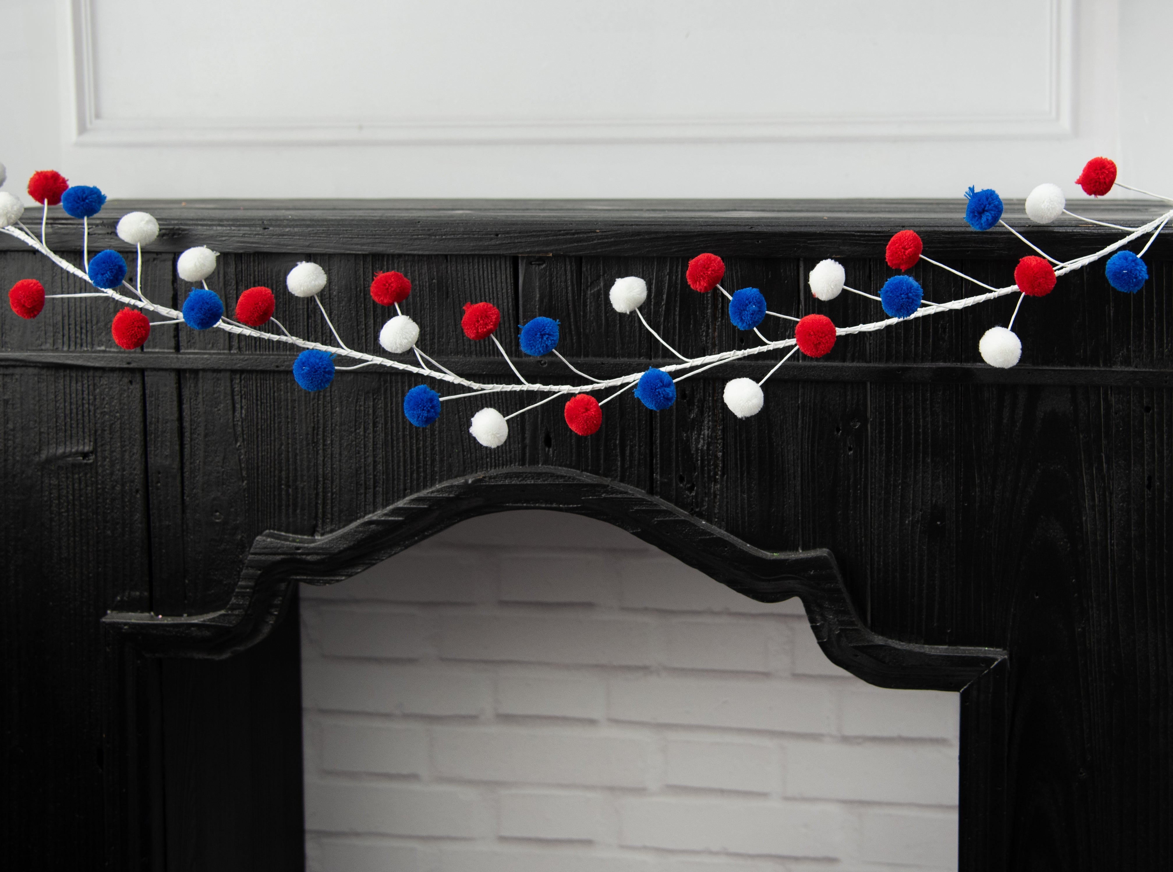 5' Pom Pom Wire Garland: Red, White & Blue Lifestyle Photo