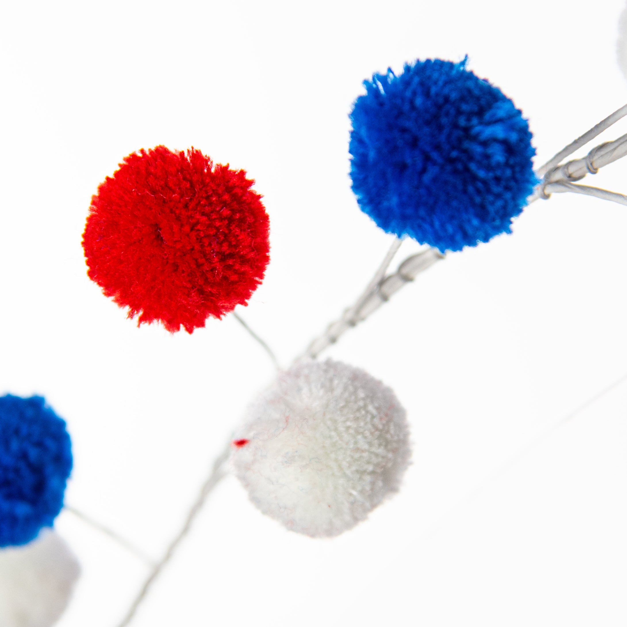 5' Pom Pom Wire Garland: Red, White & Blue detail photo 3