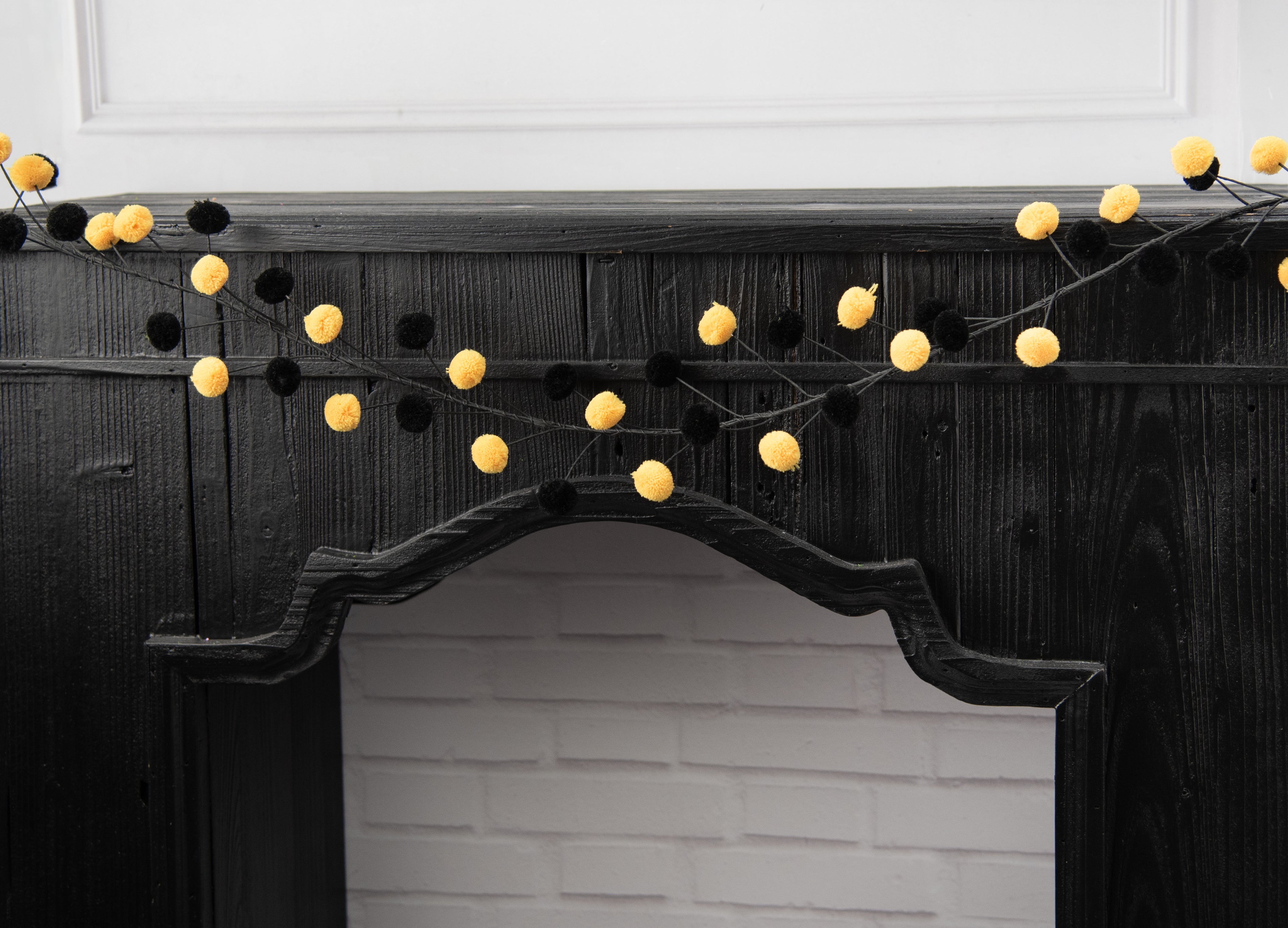 5' Pom Pom Wire Garland: Yellow & Black Lifestyle Photo