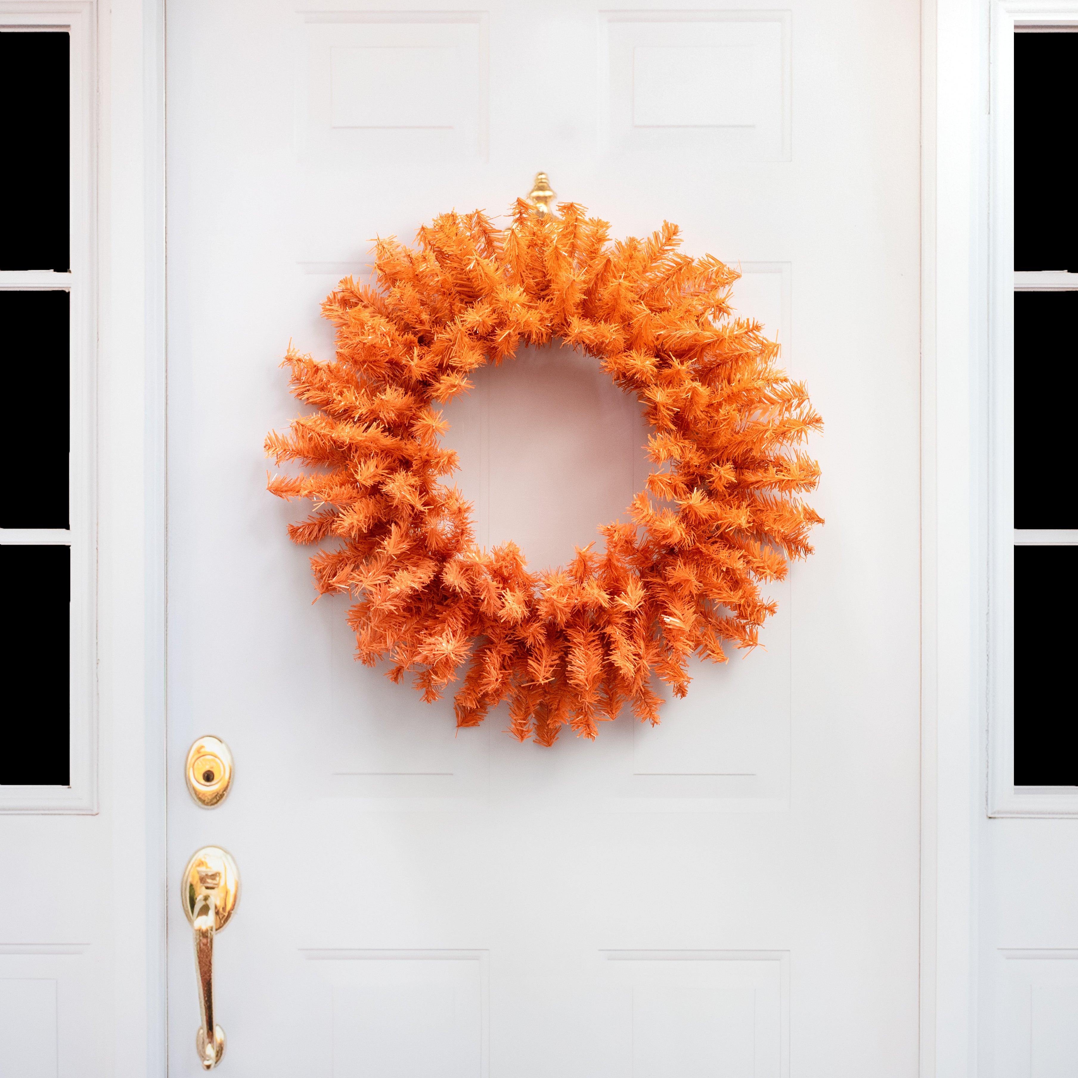 24" PVC Pine Wreath: Orange Lifestyle Photo
