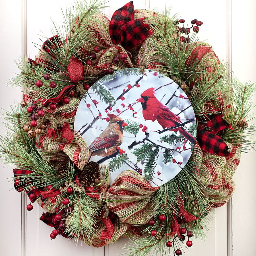 12" Round Metal Sign: Cardinals on Snowy Branch Lifestyle Photo