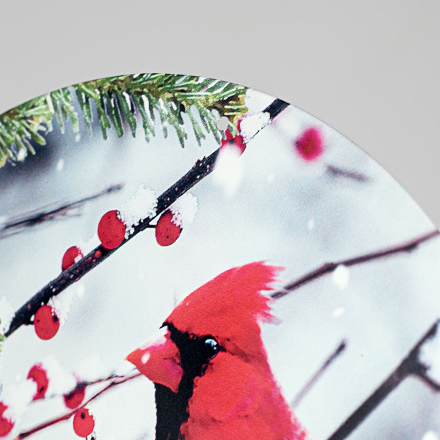 12" Round Metal Sign: Cardinals on Snowy Branch detail photo 3