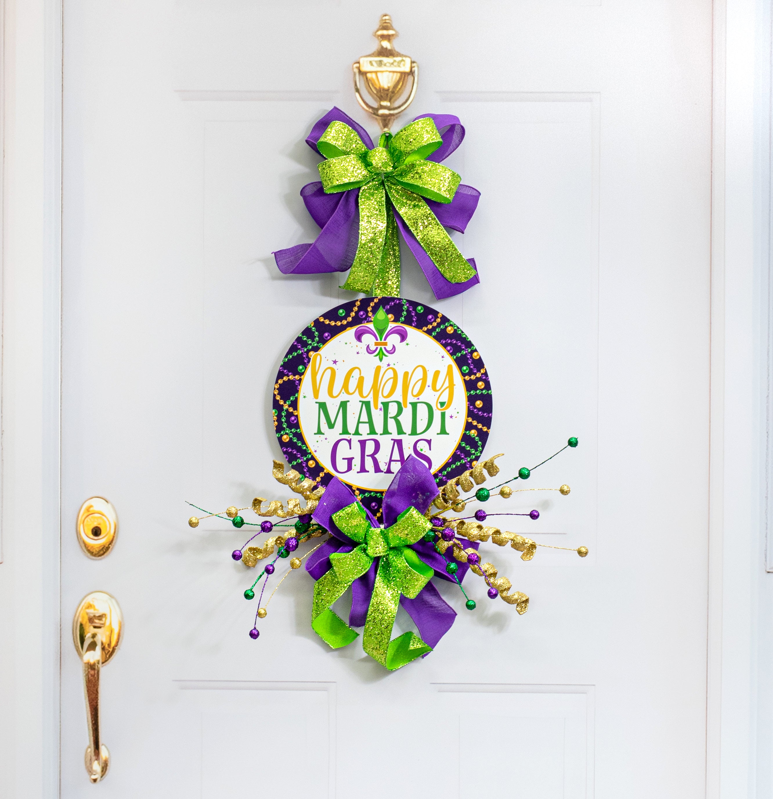 14" Round Waterproof BowTie Sign: Happy Mardi Gras Beads Lifestyle Photo