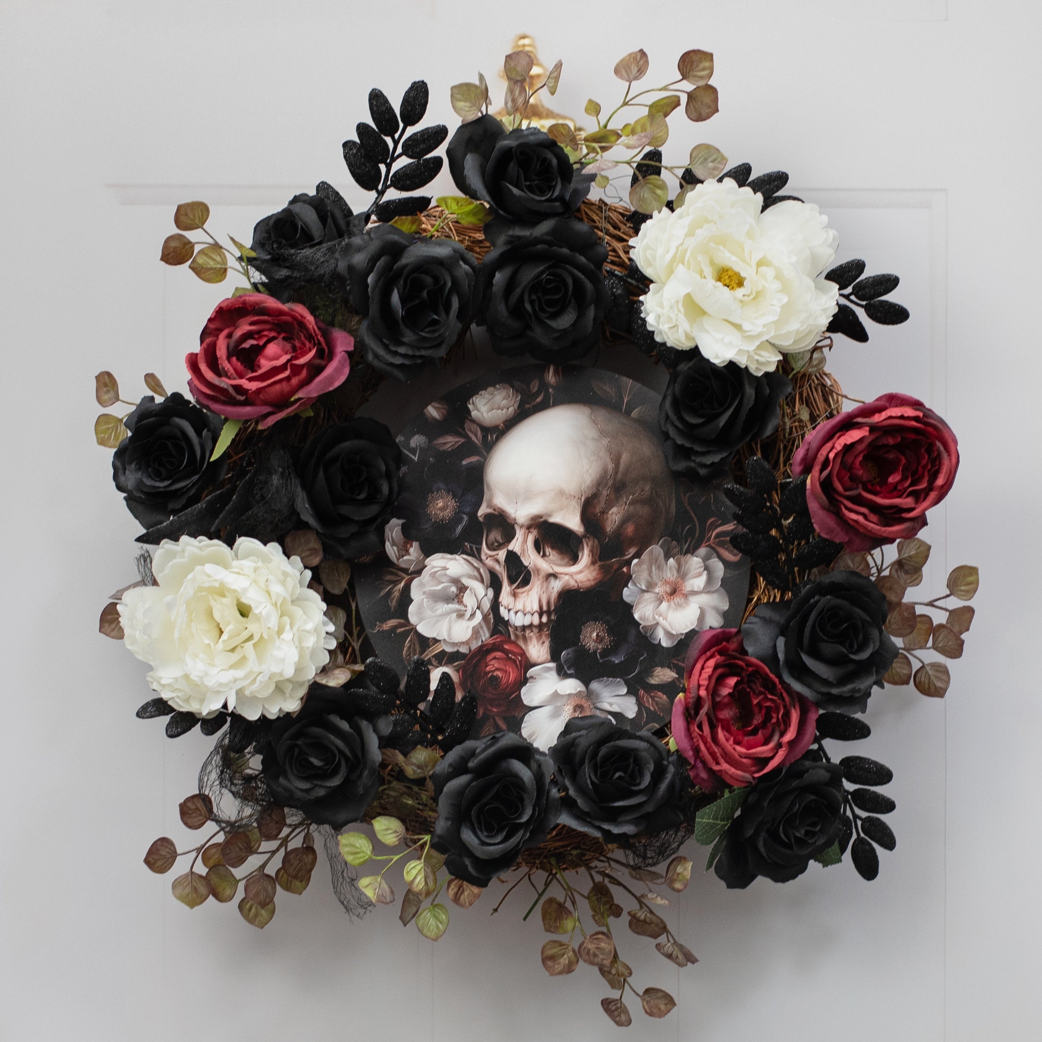 10.5" Round Waterproof Sign: Black, White & Red Floral Skull Lifestyle Photo