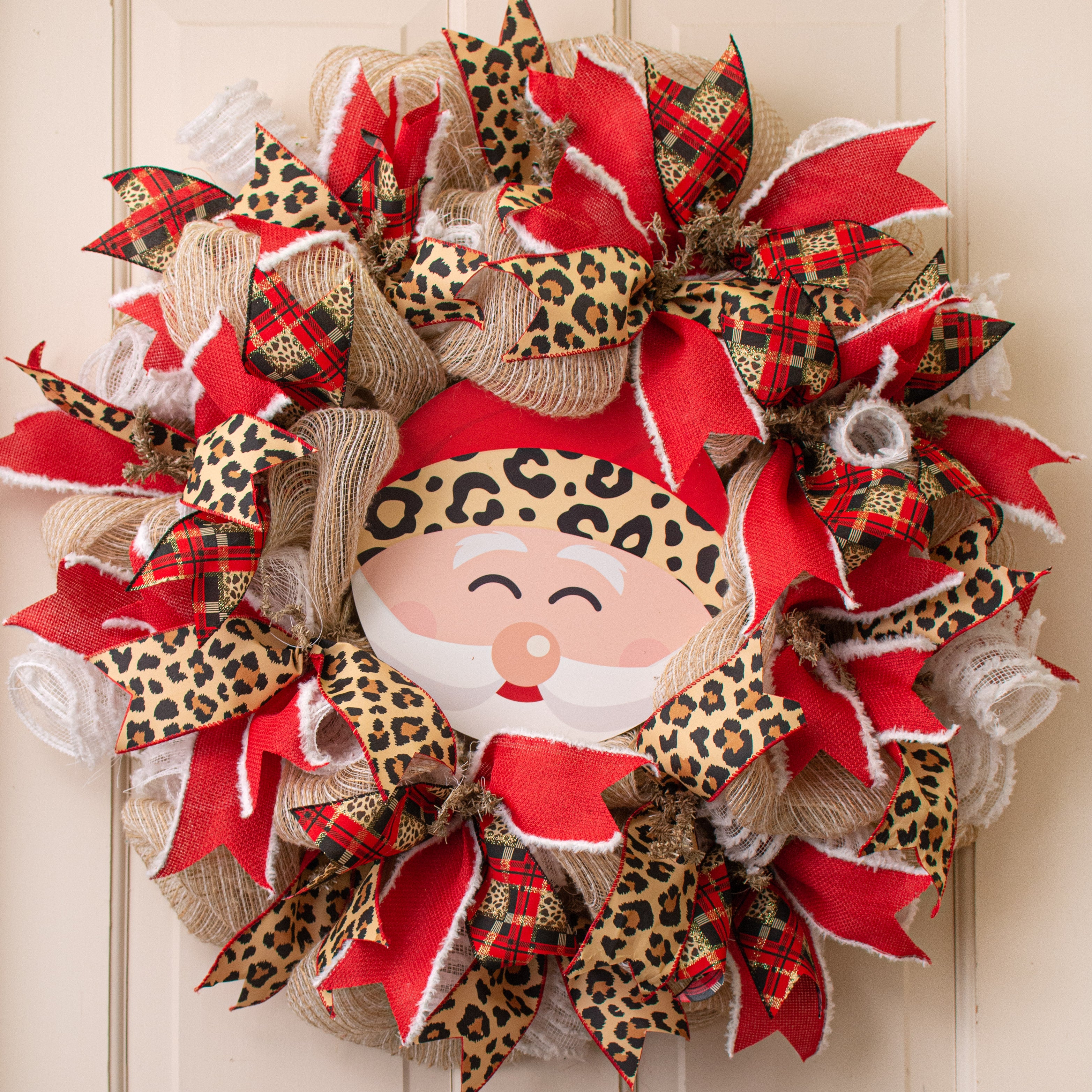 9.4" Round Waterproof Sign: Happy Santa with Cheetah Print Lifestyle Photo