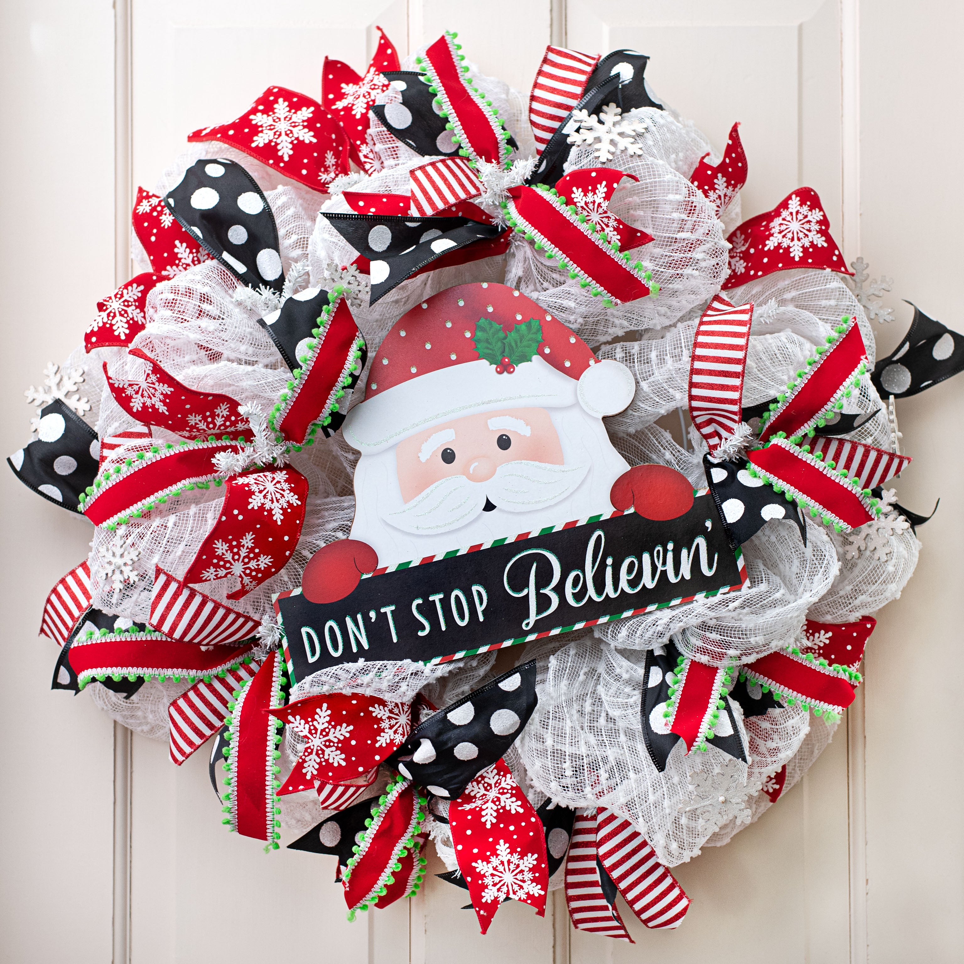 12" Santa Holding Sign: Don't Stop Believin' Lifestyle Photo