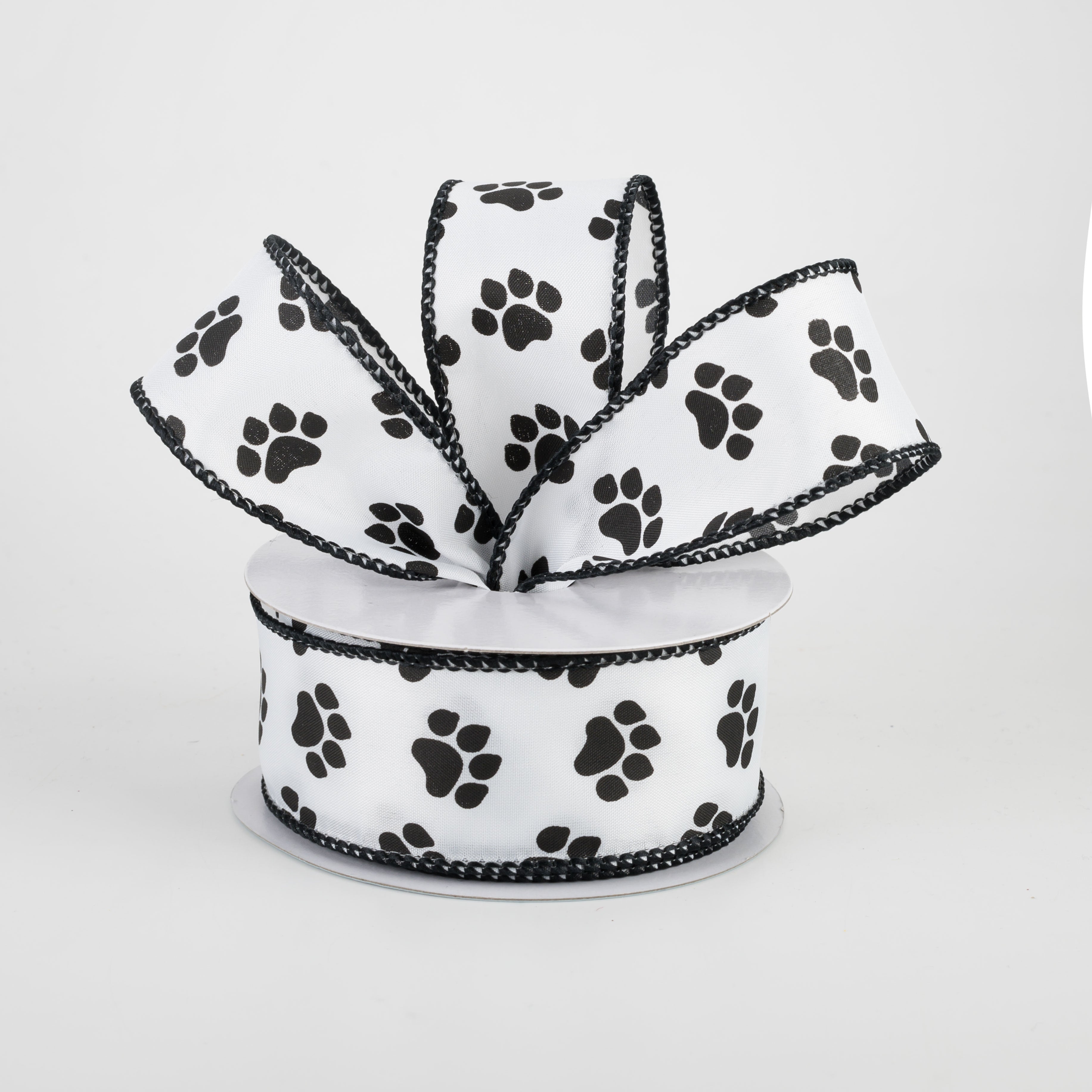 1.5" Satin Paw Print Ribbon: Black & White (10 Yards) Lifestyle Photo