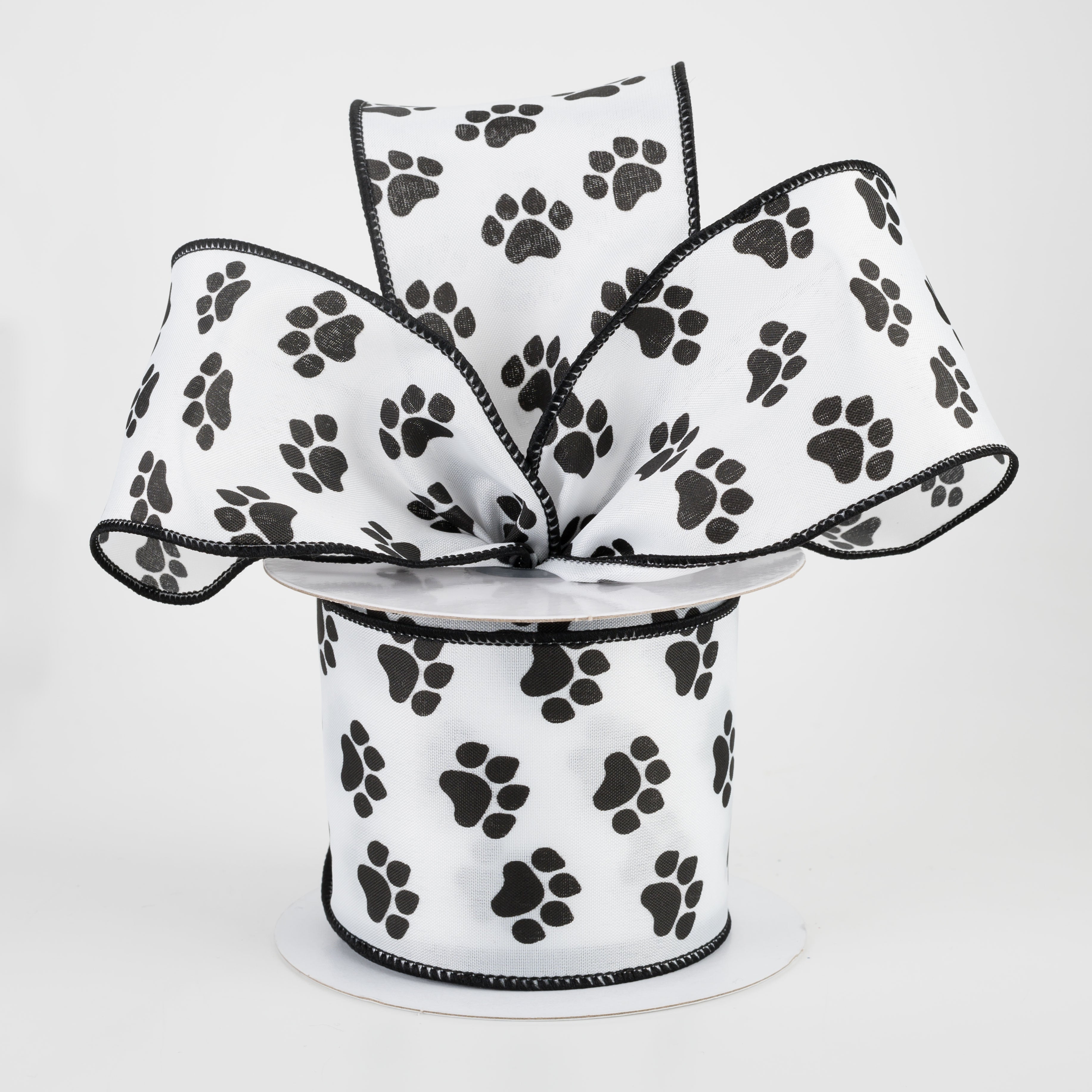 2.5" Satin Paw Print Ribbon: Black & White (10 Yards) Lifestyle Photo