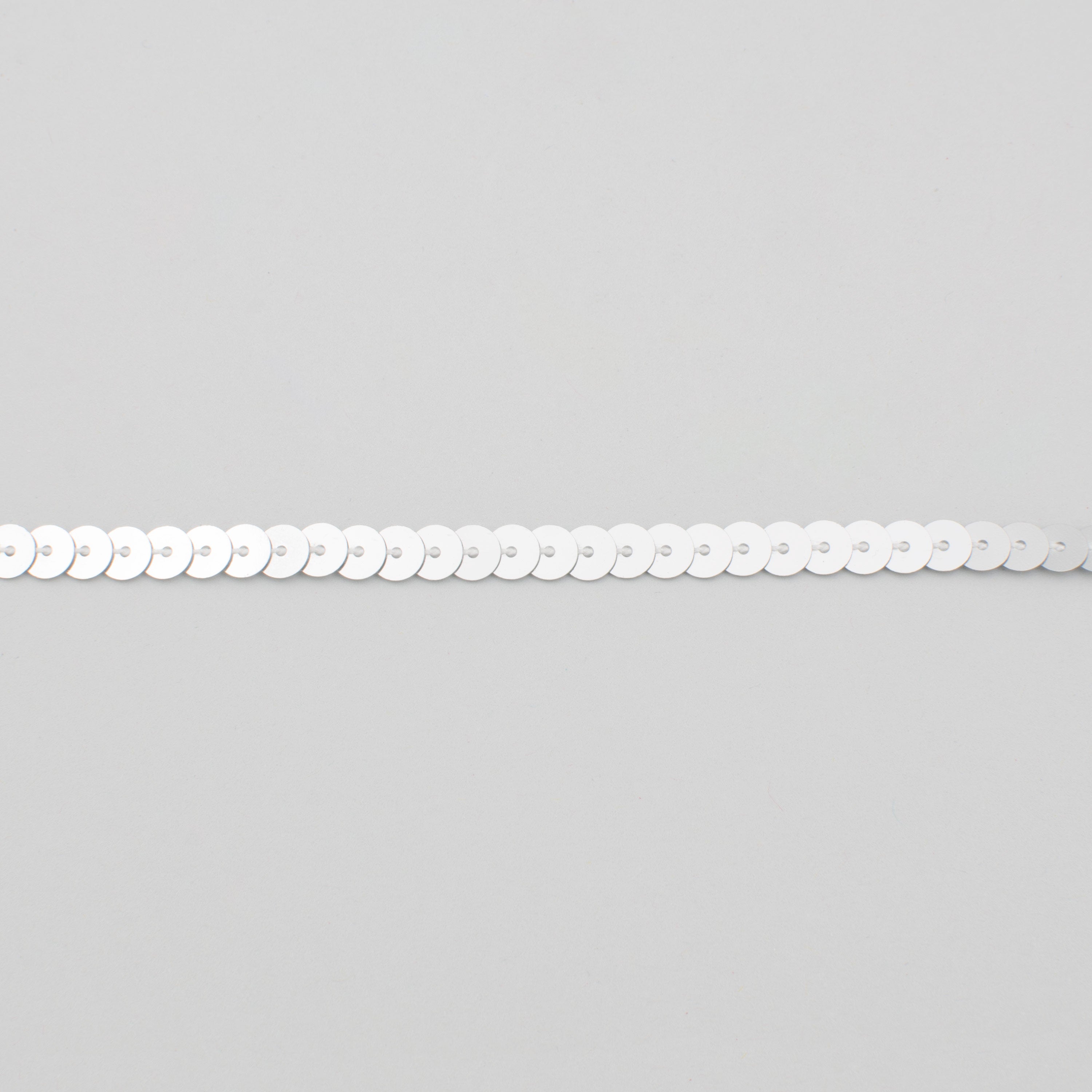 0.25" Sequin Trim: Metallic Silver (100 Yards) detail photo 3