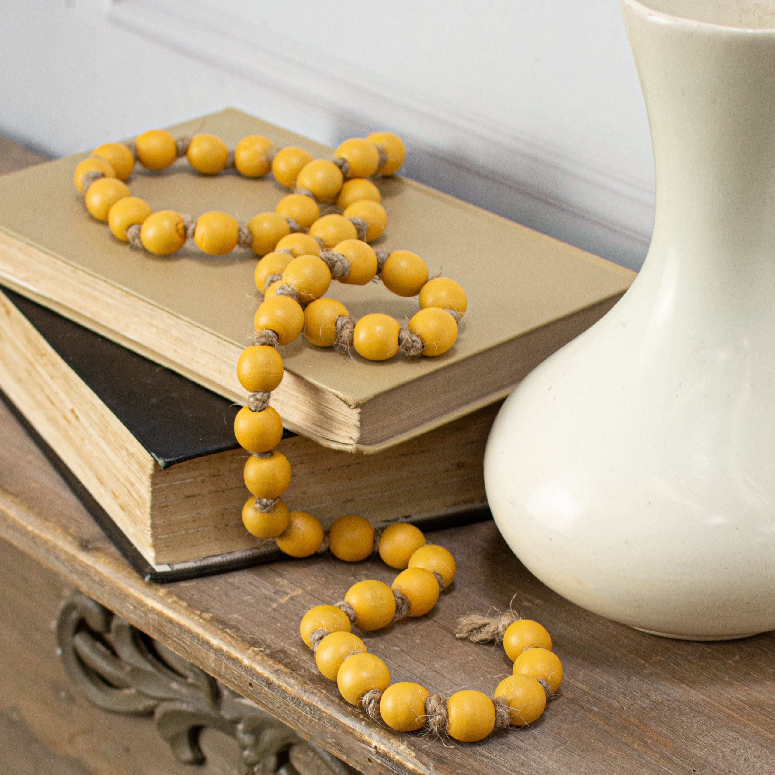 39" Small Wood Bead Garland: Mustard Lifestyle Photo