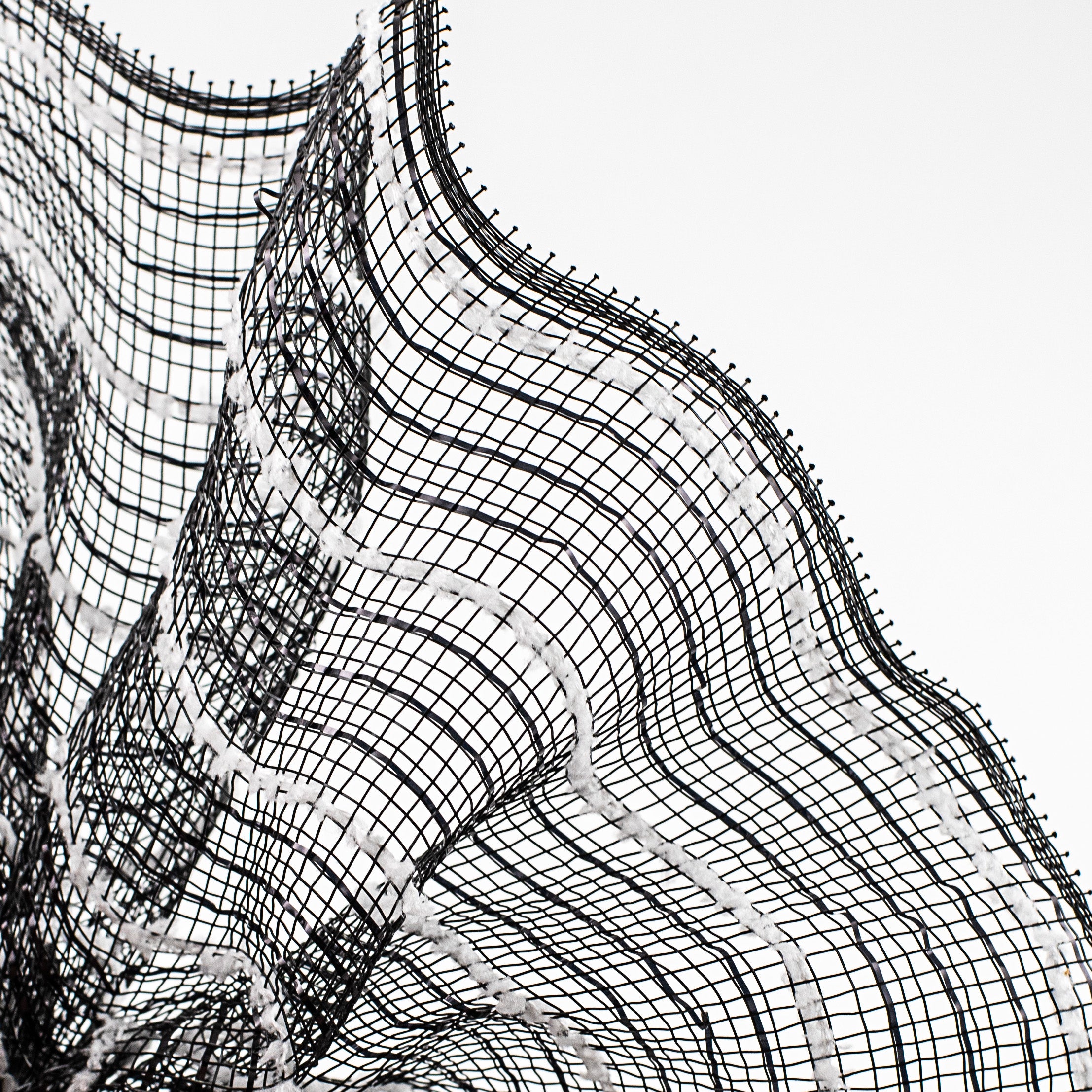 10" Snowdrift Deco Mesh: Black Foil & White Lifestyle Photo