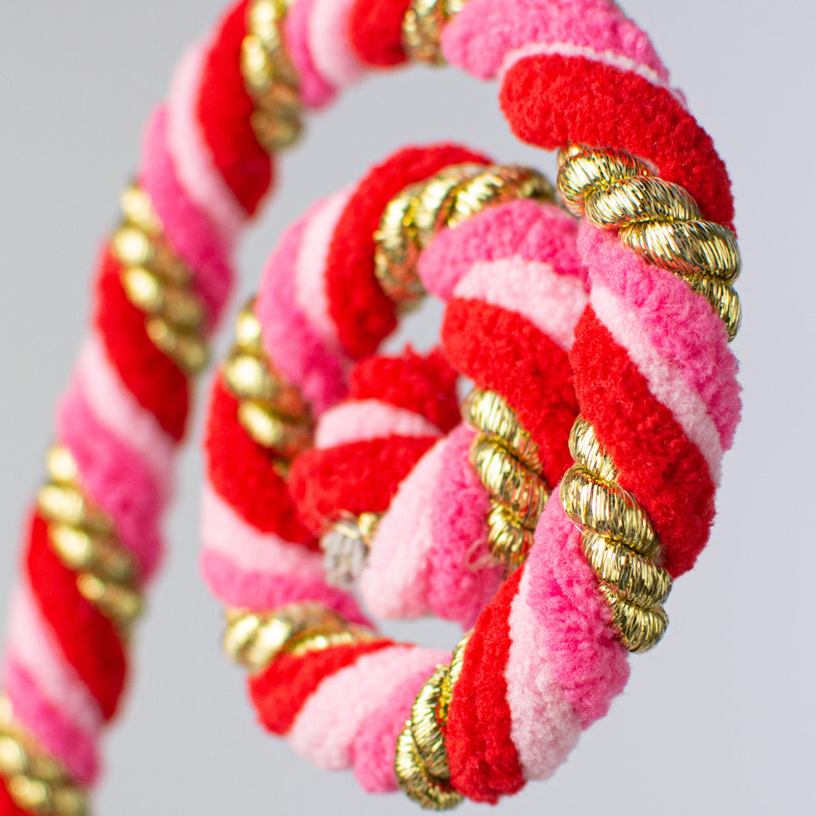 26" Spiral Curly Spray: Red, Pink, Gold Lifestyle Photo