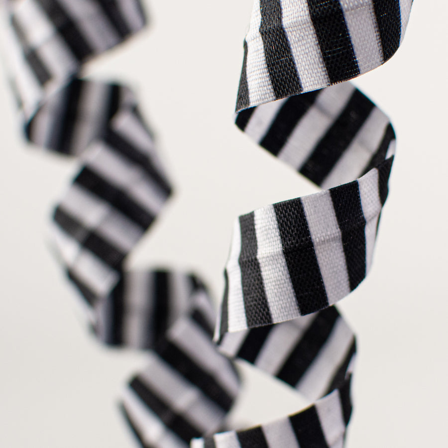 16" Stripe Curly Pick: Black & White Lifestyle Photo