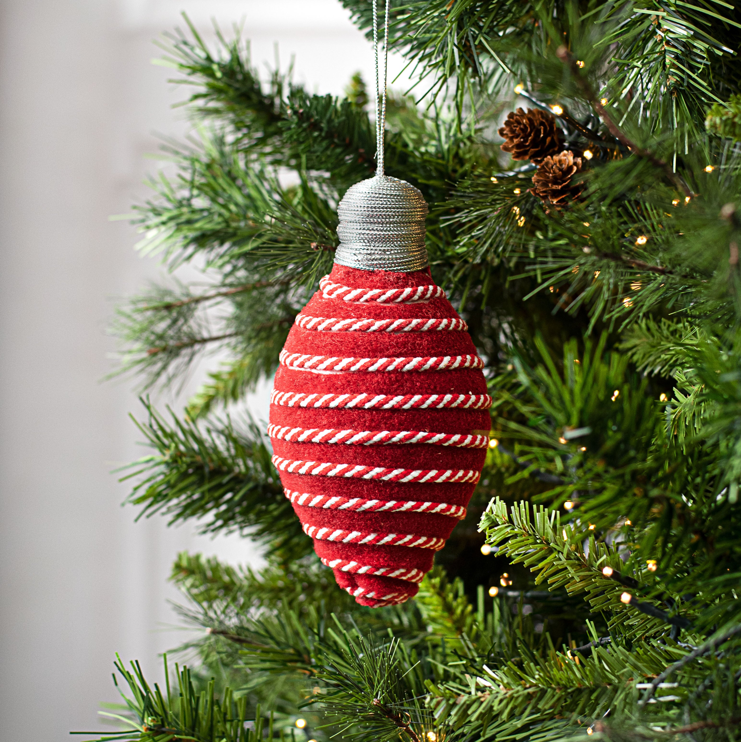 8" Stripe On Felt Lightbulb Ornament: Red & White Lifestyle Photo
