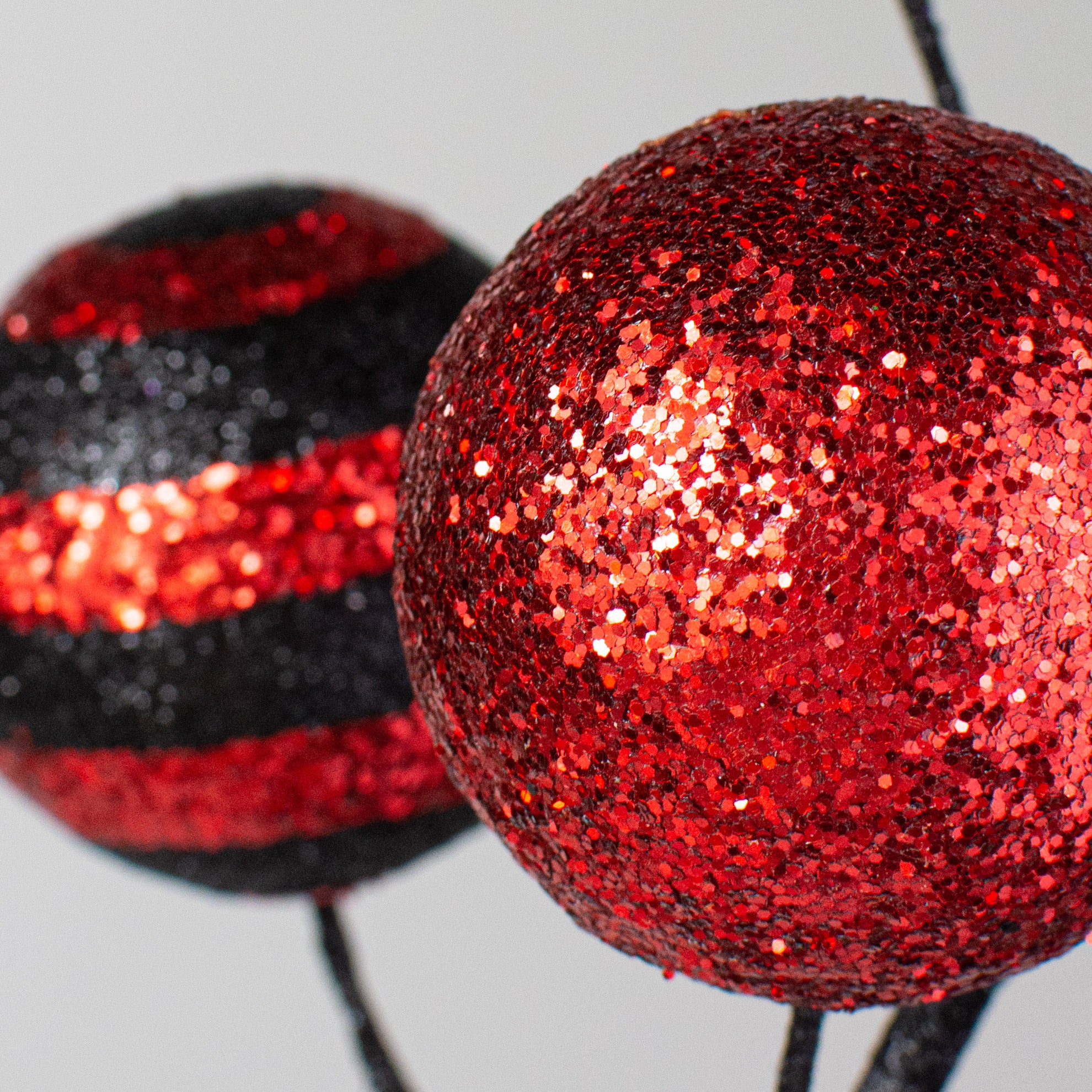 19" Stripe & Solid Glitter Ball Pick: Black & Red Lifestyle Photo