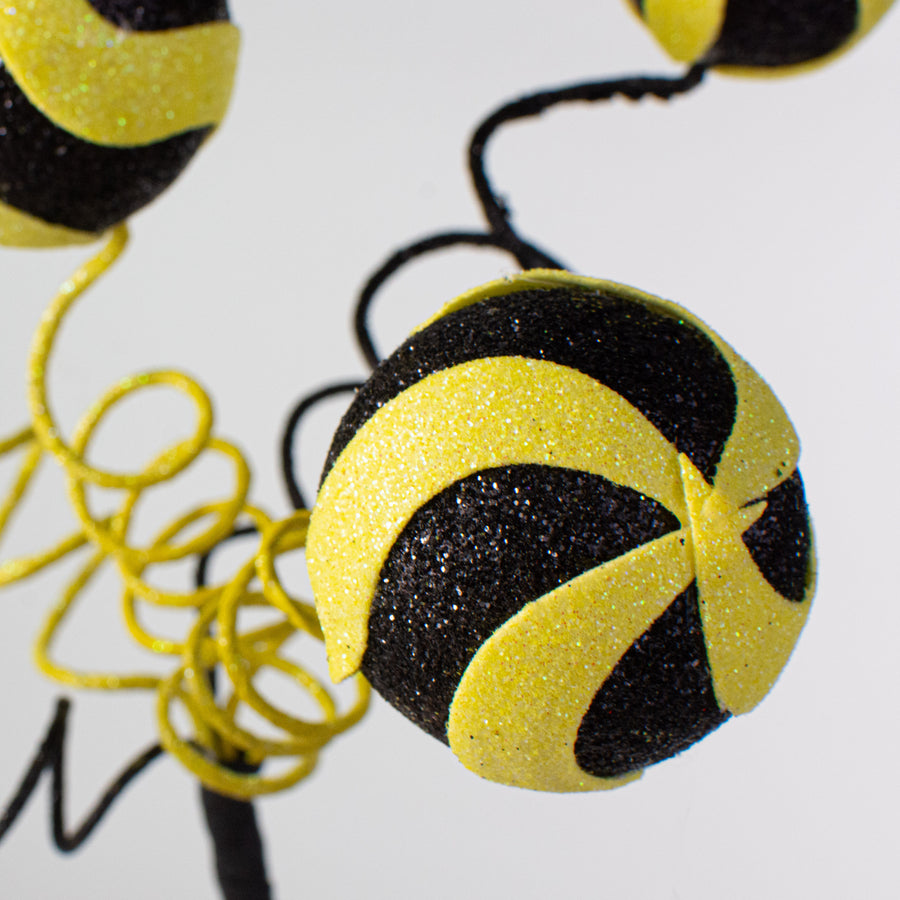 16" Swirl Ball Pick: Black & Yellow Lifestyle Photo