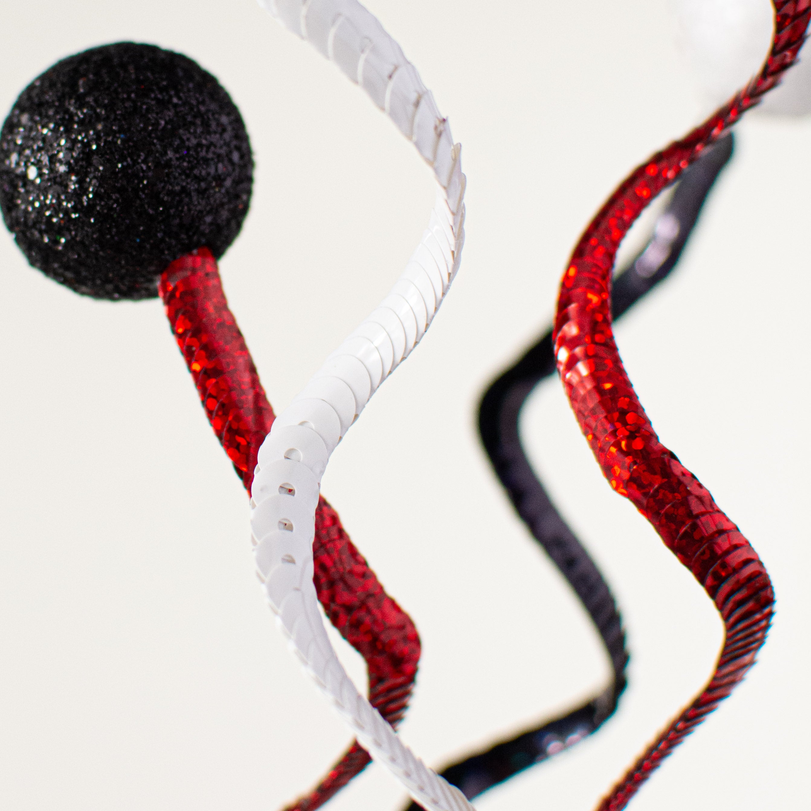 26" Swirl Sequin Glitter Ball Spray: Black, Red, White Lifestyle Photo