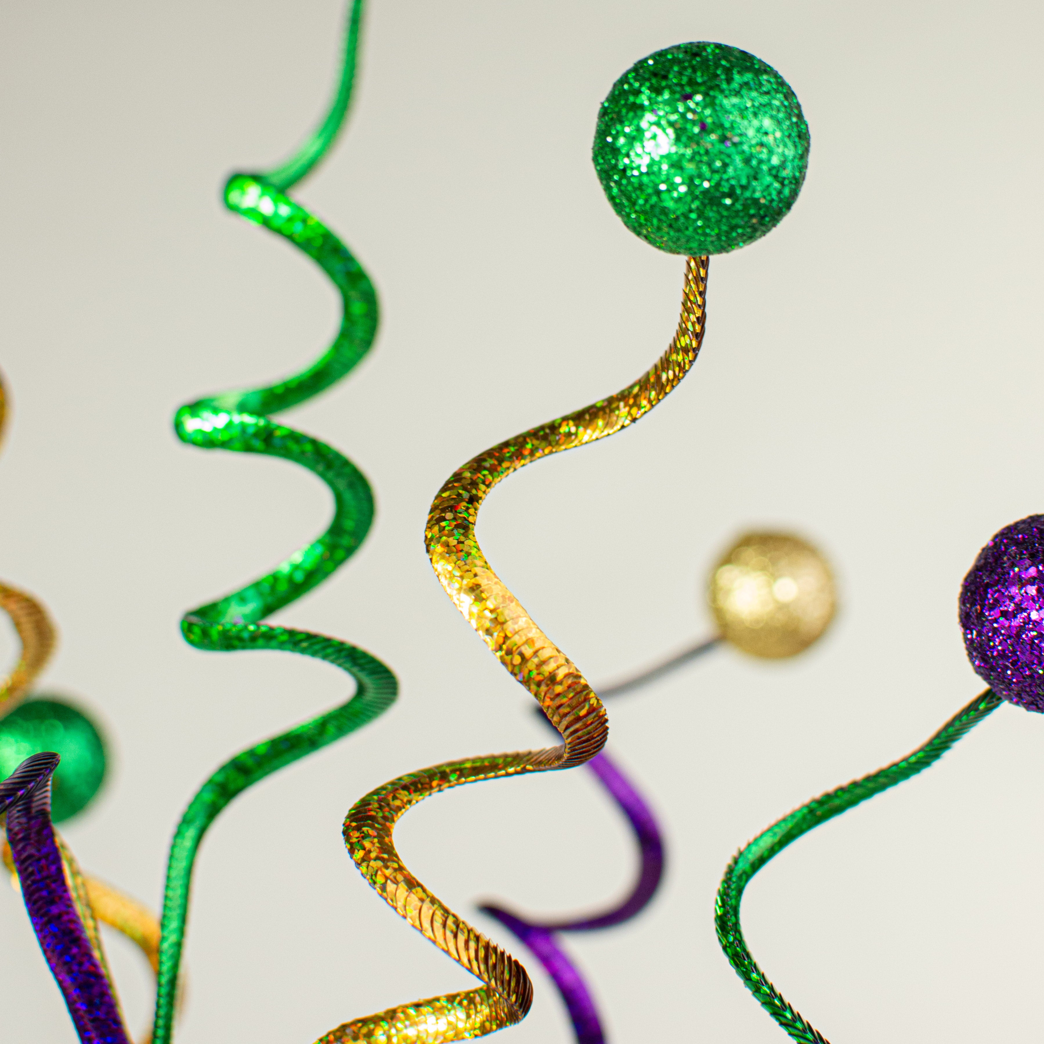 26" Swirl Sequin Glitter Ball Spray: Purple, Green, Gold Lifestyle Photo