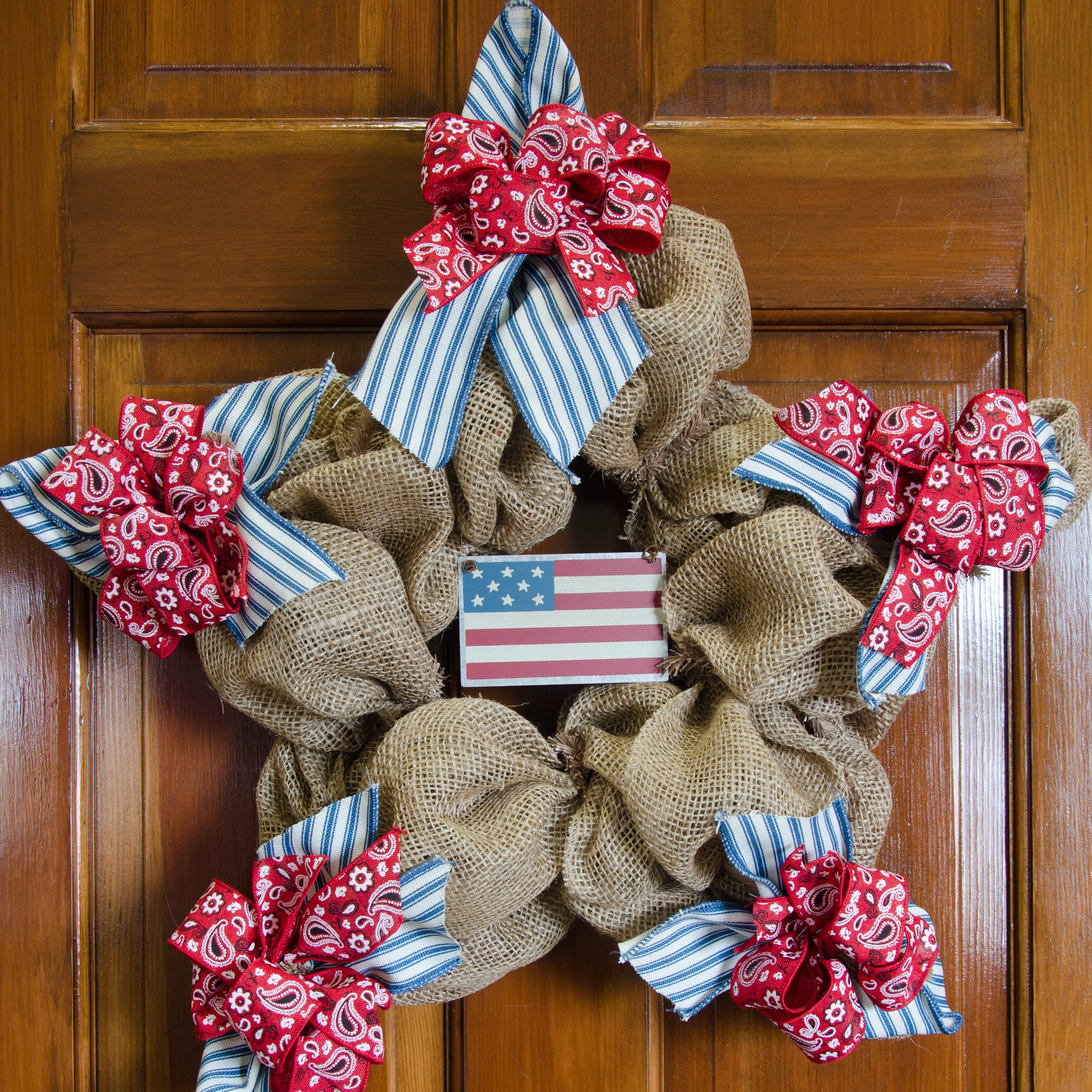 Tin American Flag Ornament (4" x 2.5) Lifestyle Photo