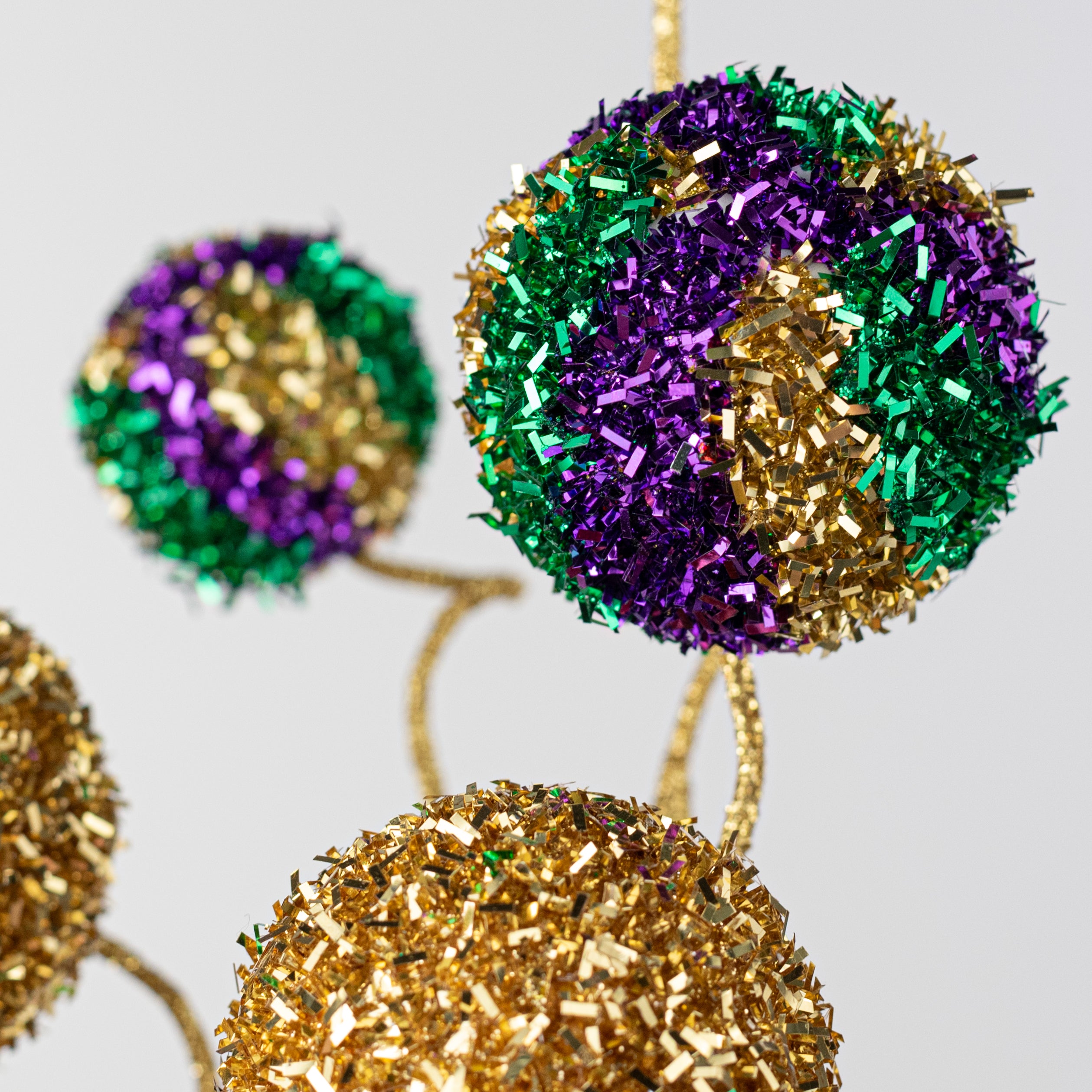 20" V-Cut Foil Ball Spray: Mardi Gras Lifestyle Photo