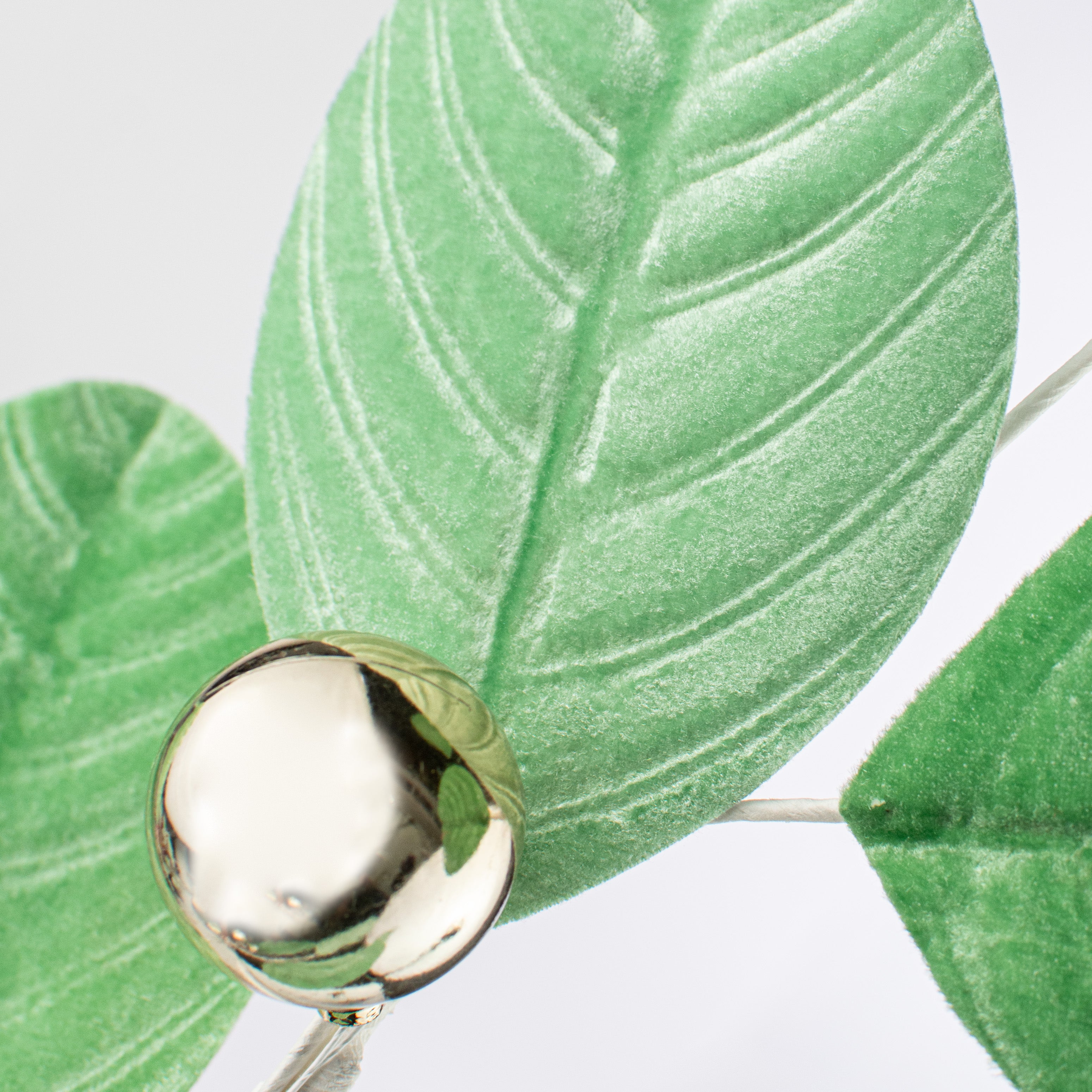 31" Velvet Leaf Spray: Frozen Green Lifestyle Photo