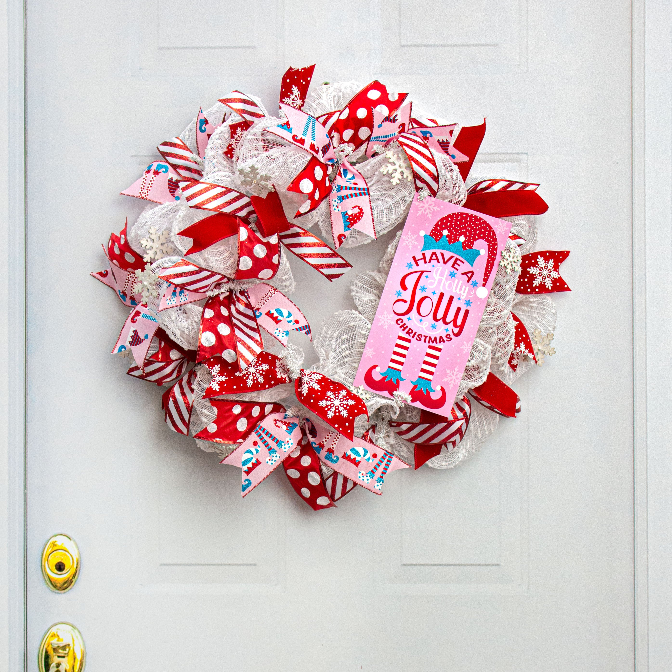 12" Waterproof Sign: Holly Jolly Elf Pink Lifestyle Photo