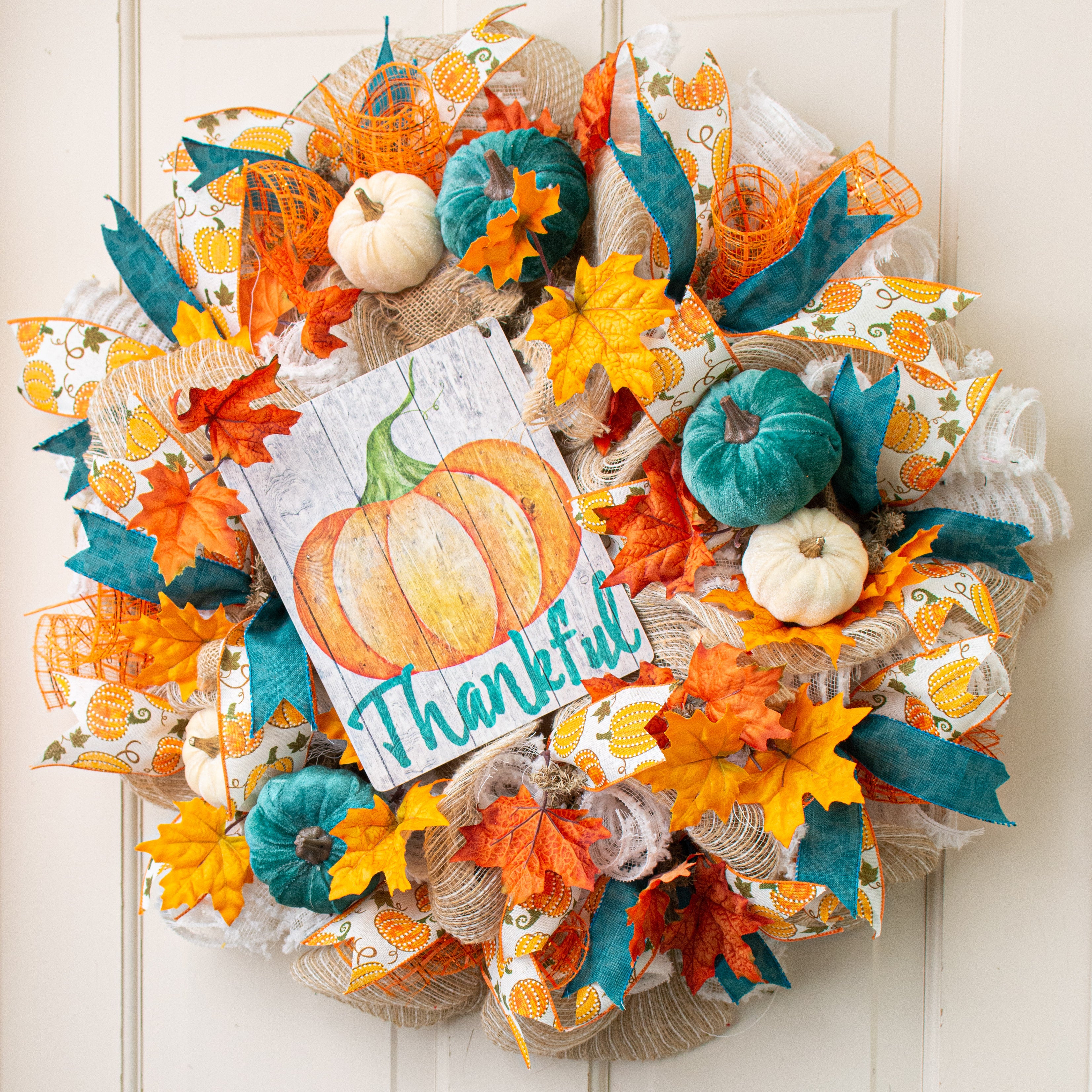 9" Waterproof Sign: Thankful Pumpkin on Wood Grain Lifestyle Photo