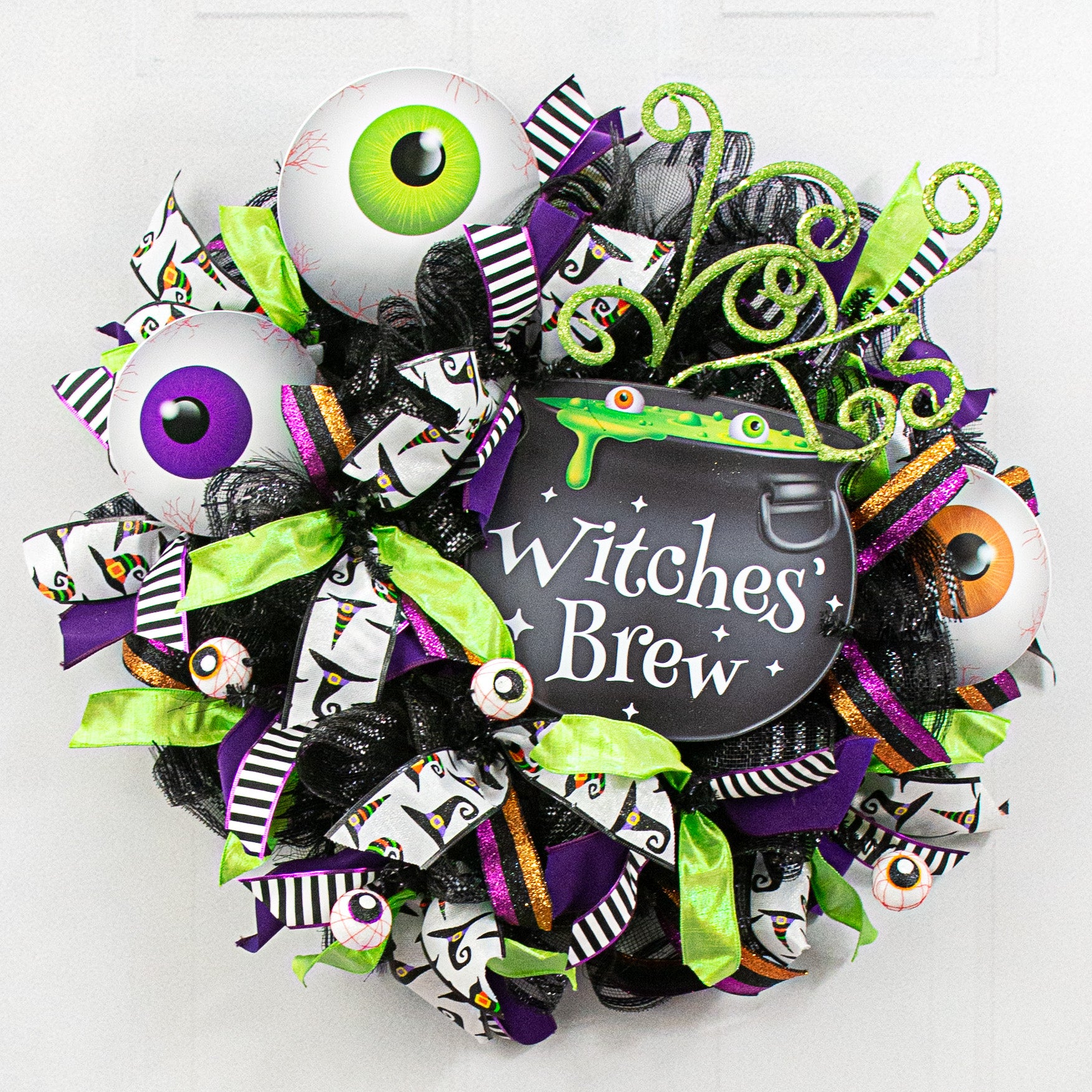 10" Waterproof Sign: Witches' Brew Eyeball Cauldron Lifestyle Photo