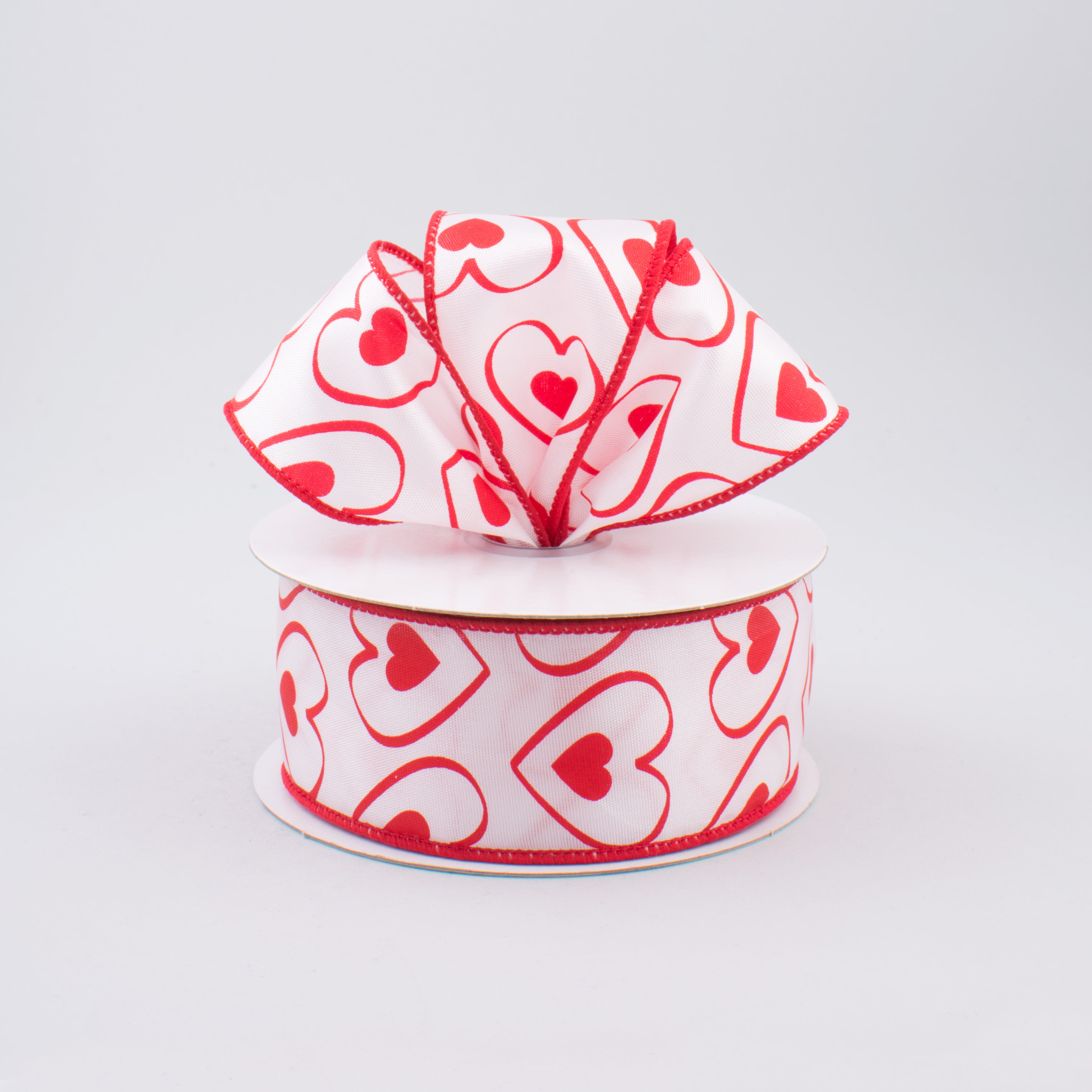 1.5" White Satin Red Heart Within Heart Ribbon (10 Yards) Lifestyle Photo