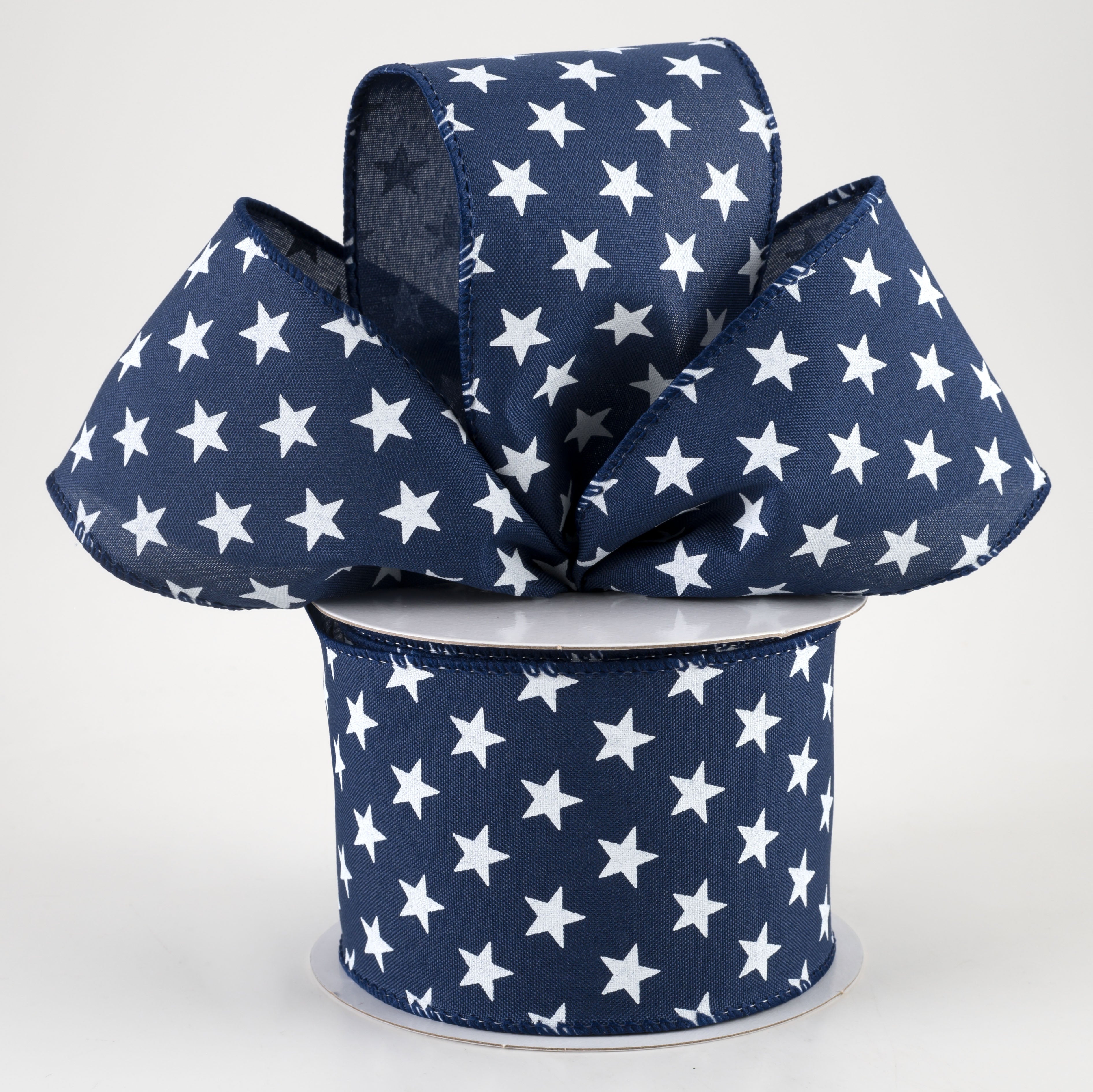 2.5" White Stars On Navy Satin Ribbon (10 Yards) Lifestyle Photo