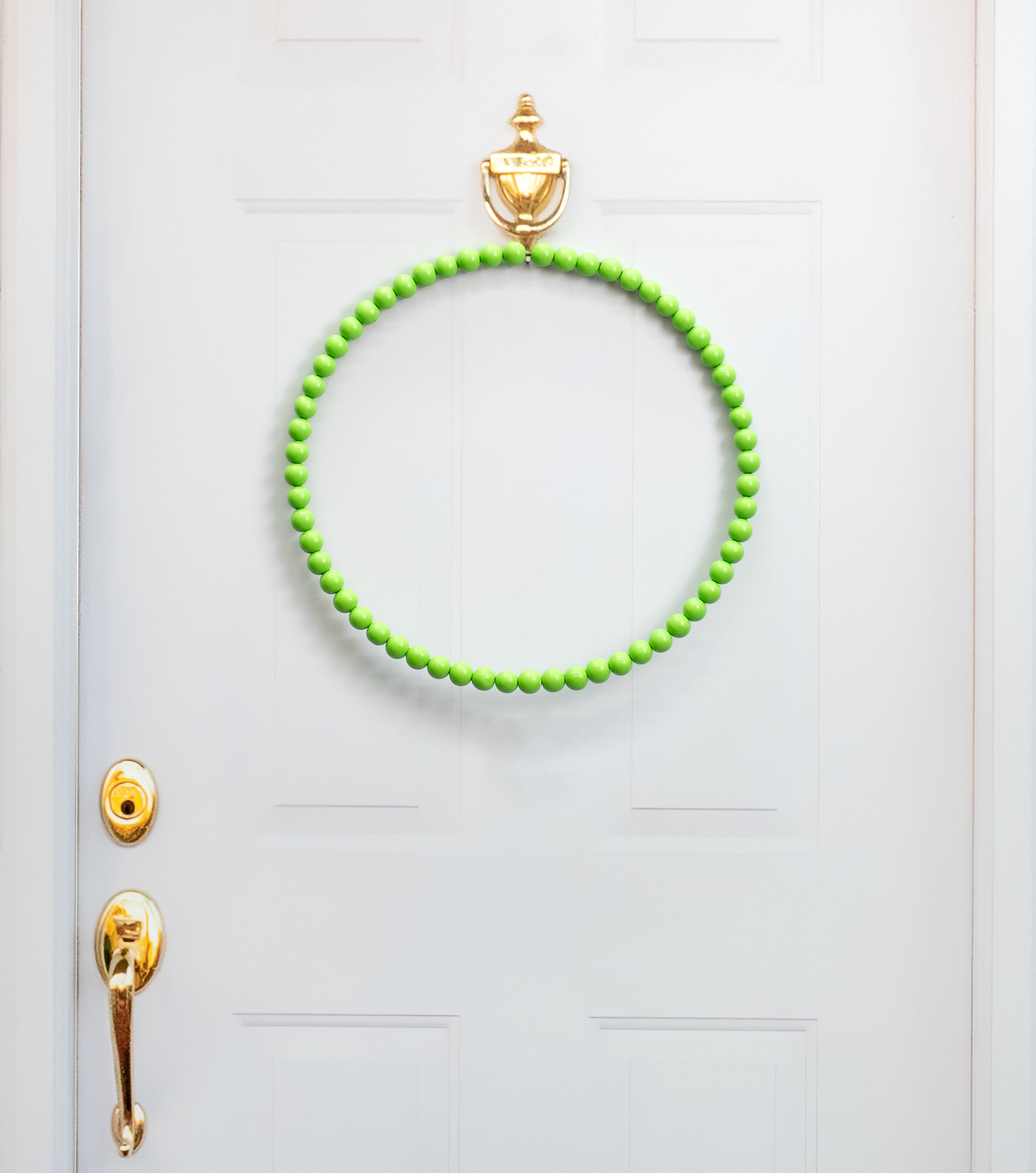 17.75" Wood Bead Wreath: Lime Green Lifestyle Photo