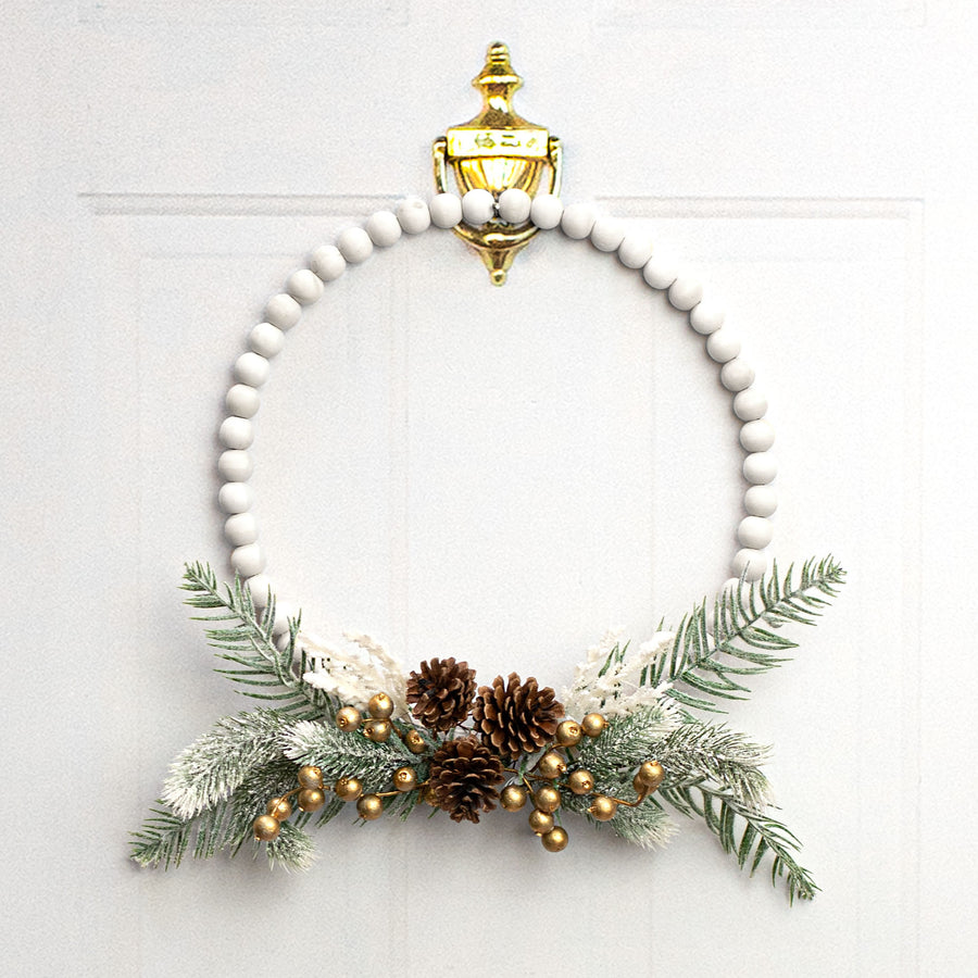 15.5" Wood Bead Wreath: Whitewash Lifestyle Photo