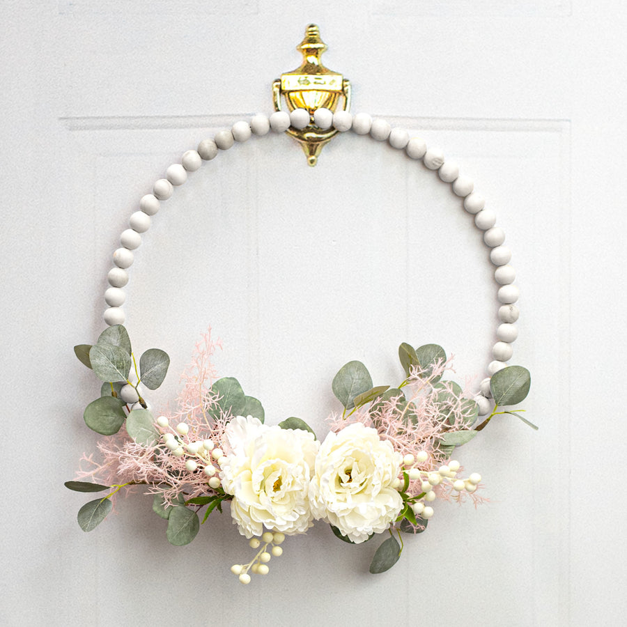 17.75" Wood Bead Wreath: Whitewash Lifestyle Photo