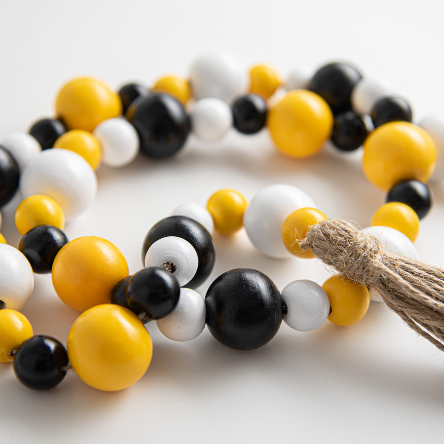4' Wooden Bead Garland: Yellow, Black, White detail photo 3