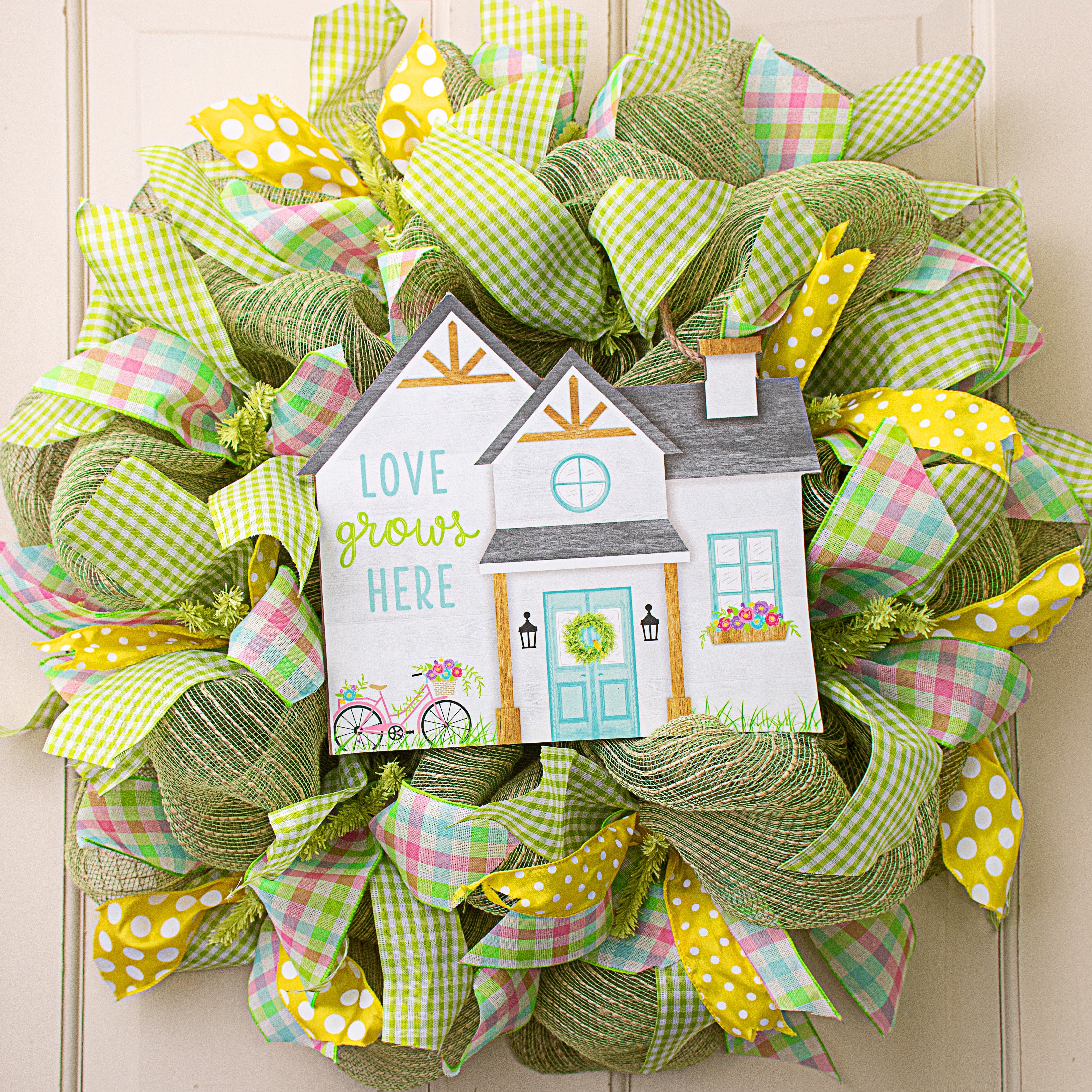 11" Wooden House Sign: Love Grows Here Lifestyle Photo
