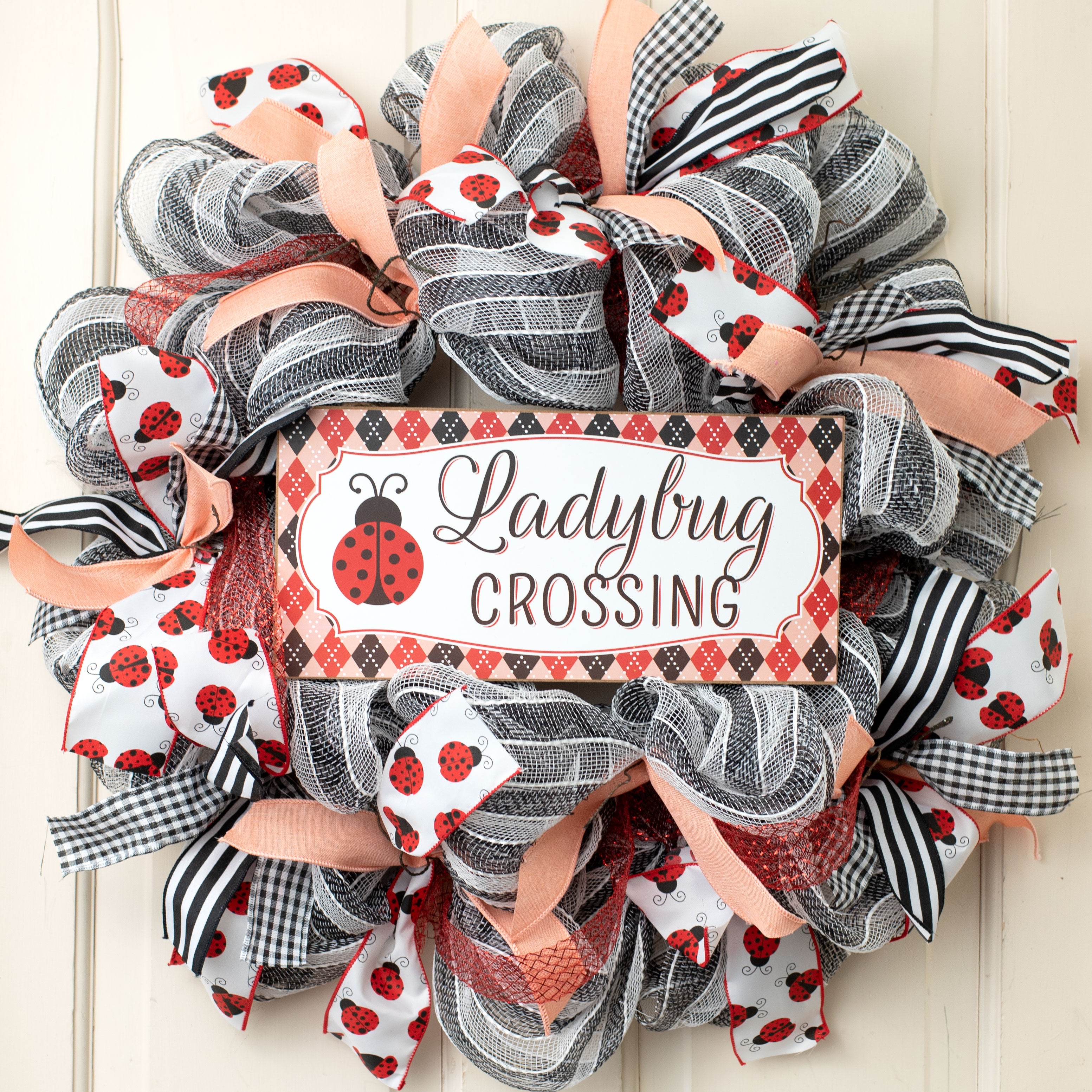 12" Wooden Sign: Argyle Ladybug Crossing Lifestyle Photo